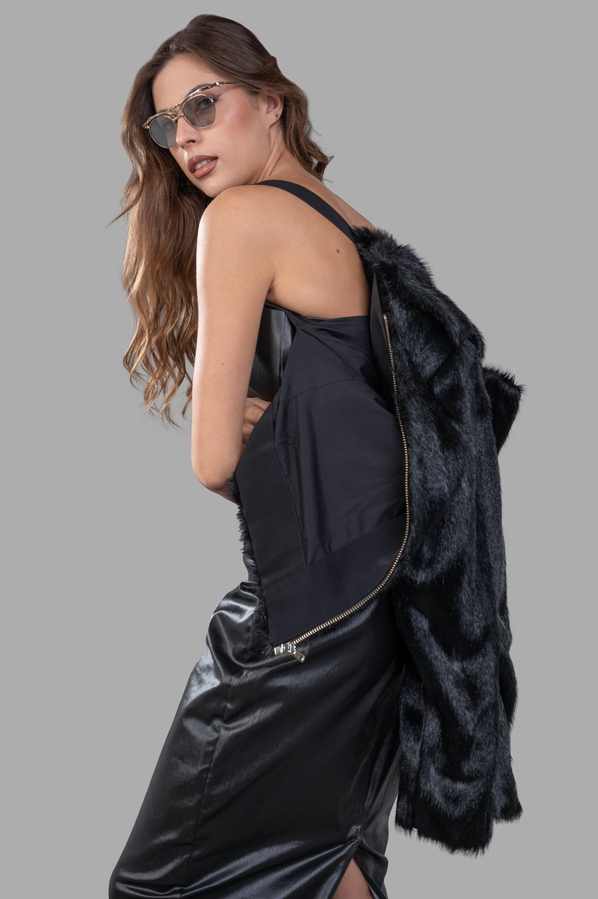 Alabama Muse Faux-fur Jacket displayed on model, showcasing soft animal-friendly fabric and stylish black design.