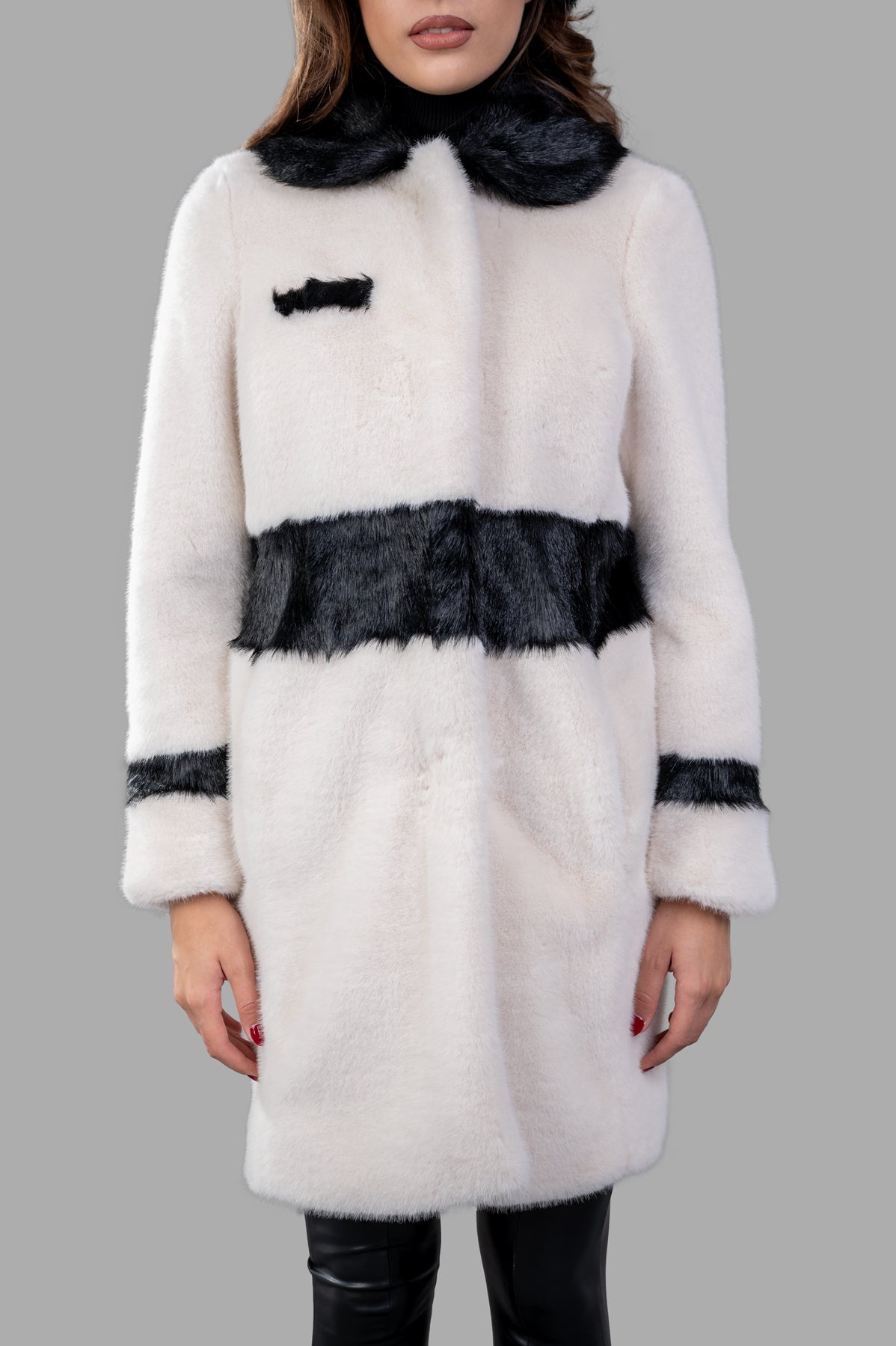 Alabama Muse Color-block Faux-fur Coat in white and black, showcasing luxurious, textured animal-friendly fabric.