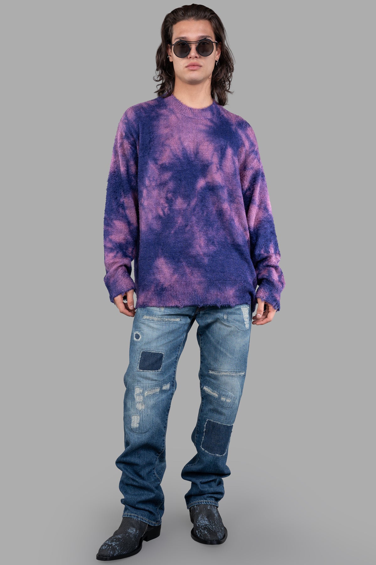 Junya Watanabe Dyed Sweater on-model, blue/pink uneven dye, ribbed collar, cuffs, and waist, adds playful sophistication.
