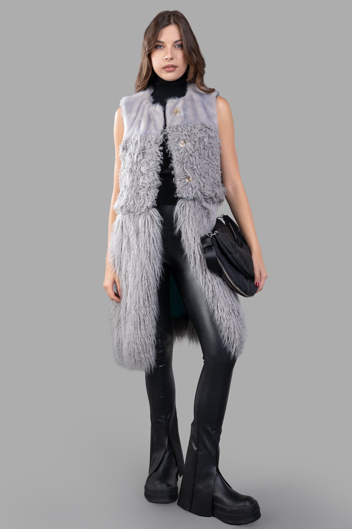 Alabama Muse Faux-fur Vest in grey, front view on model, showcases brushed texture and animal-friendly design.