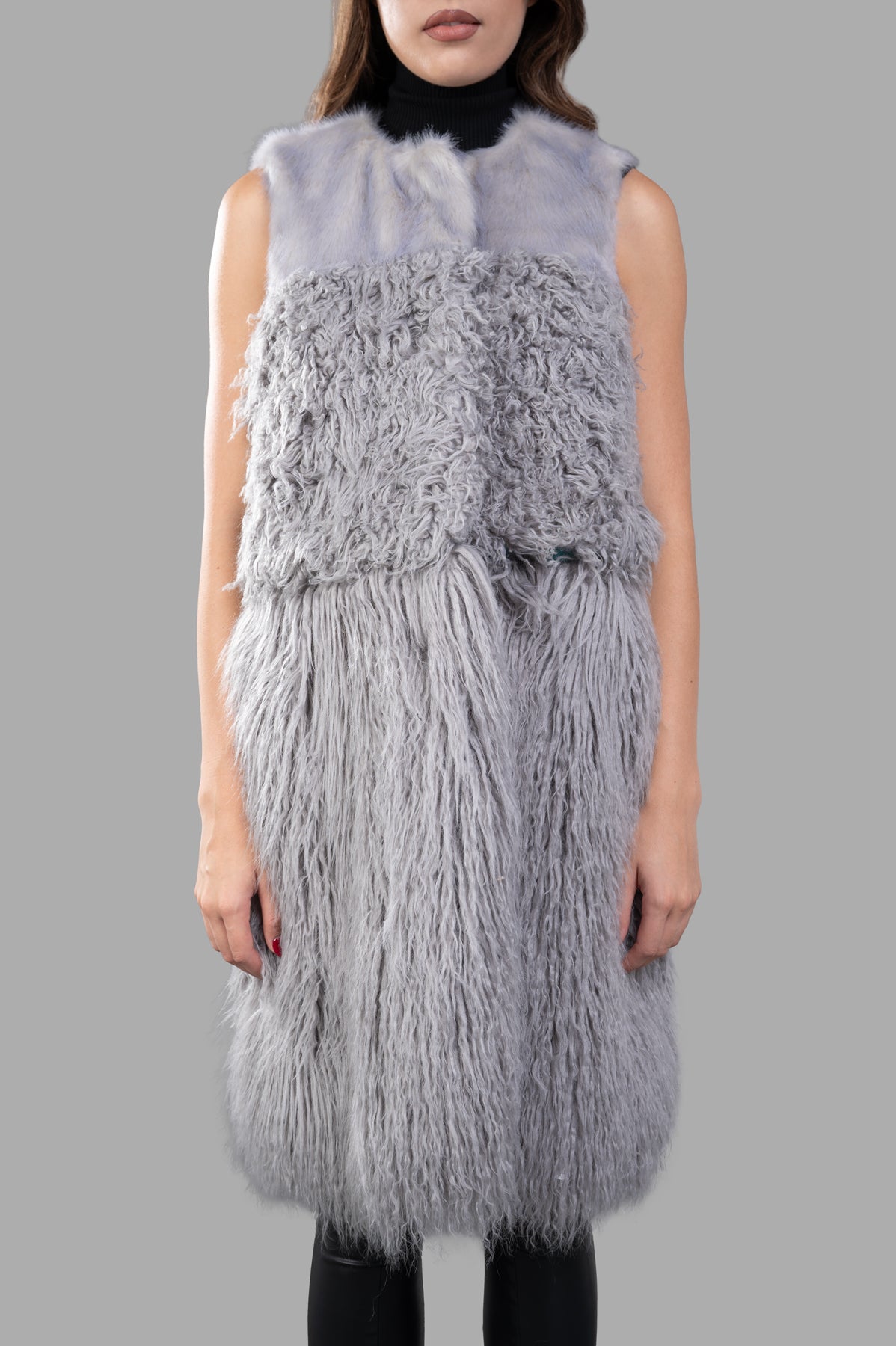 Alabama Muse Faux-fur Vest in grey, showcasing a cropped design with luxurious, soft texture against a model.