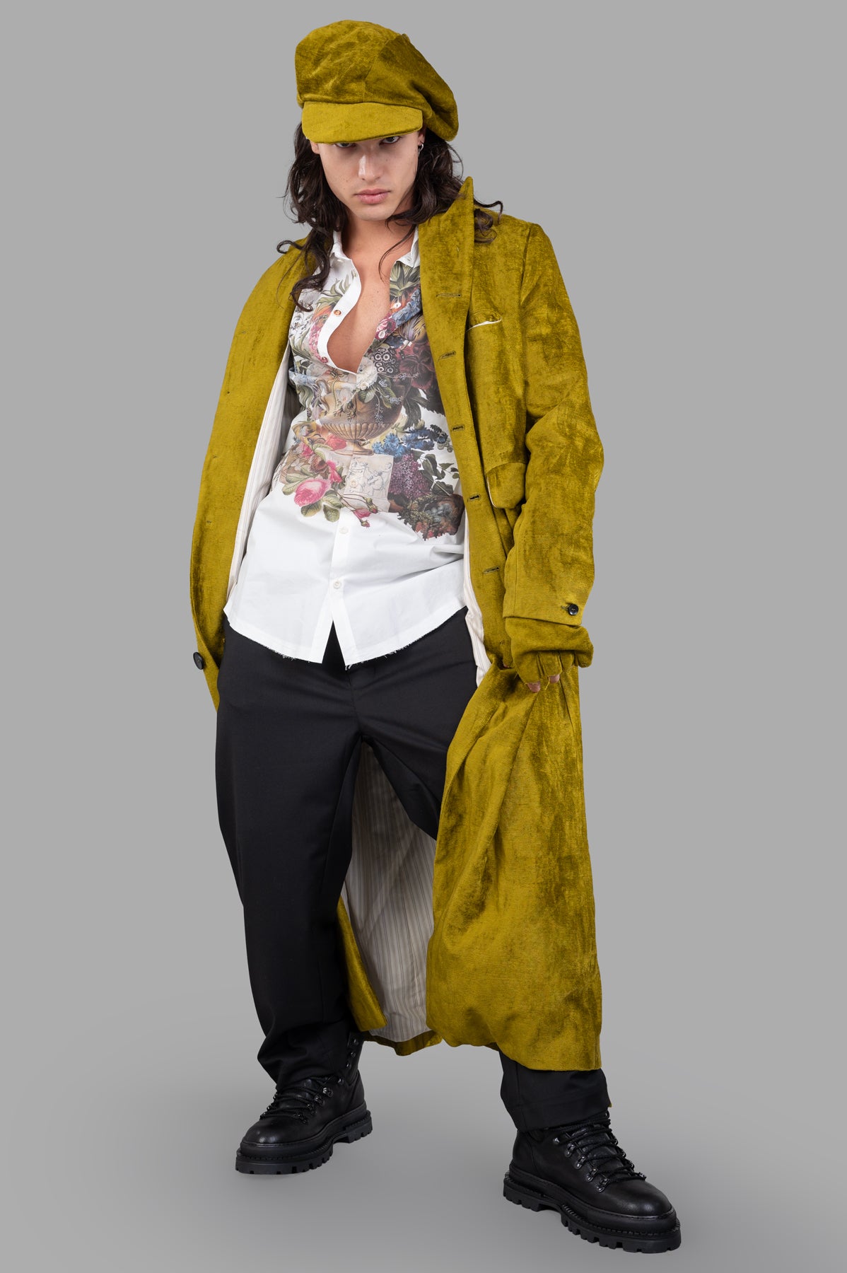 Marc Point Mustard Maxi Coat shown on model, featuring sharp lapels, single-button fastening, and large back vent.