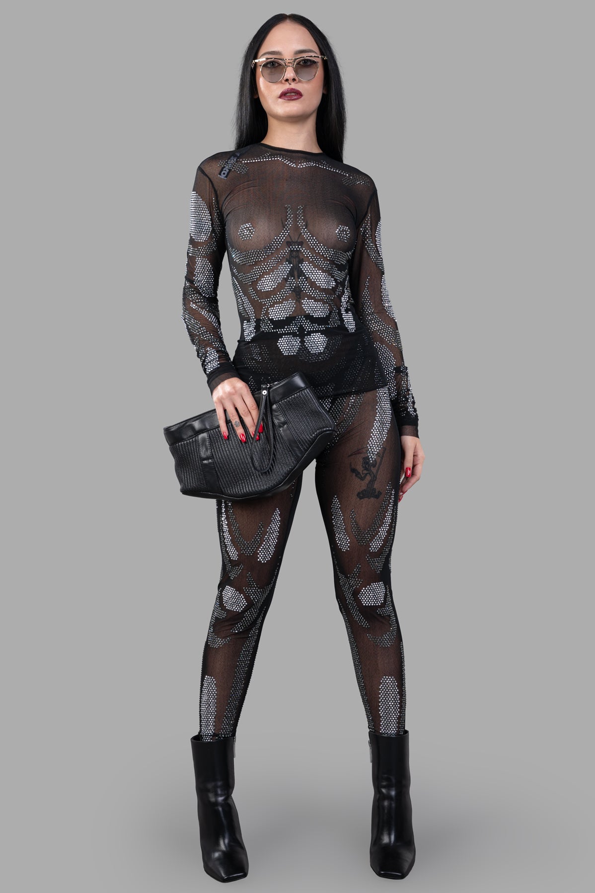 Natasha Zinko Rhinestones Embellished Top in black, front view on model, see-through design with sparkling details.