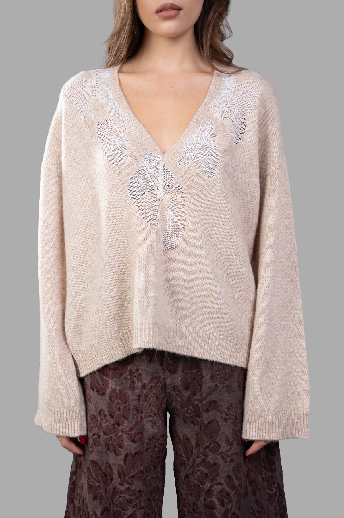Uma Wang Long-sleeve Sweater featuring a V-neck, drop shoulders, and elegant drop-stitch detailing in soft beige marl knit.
