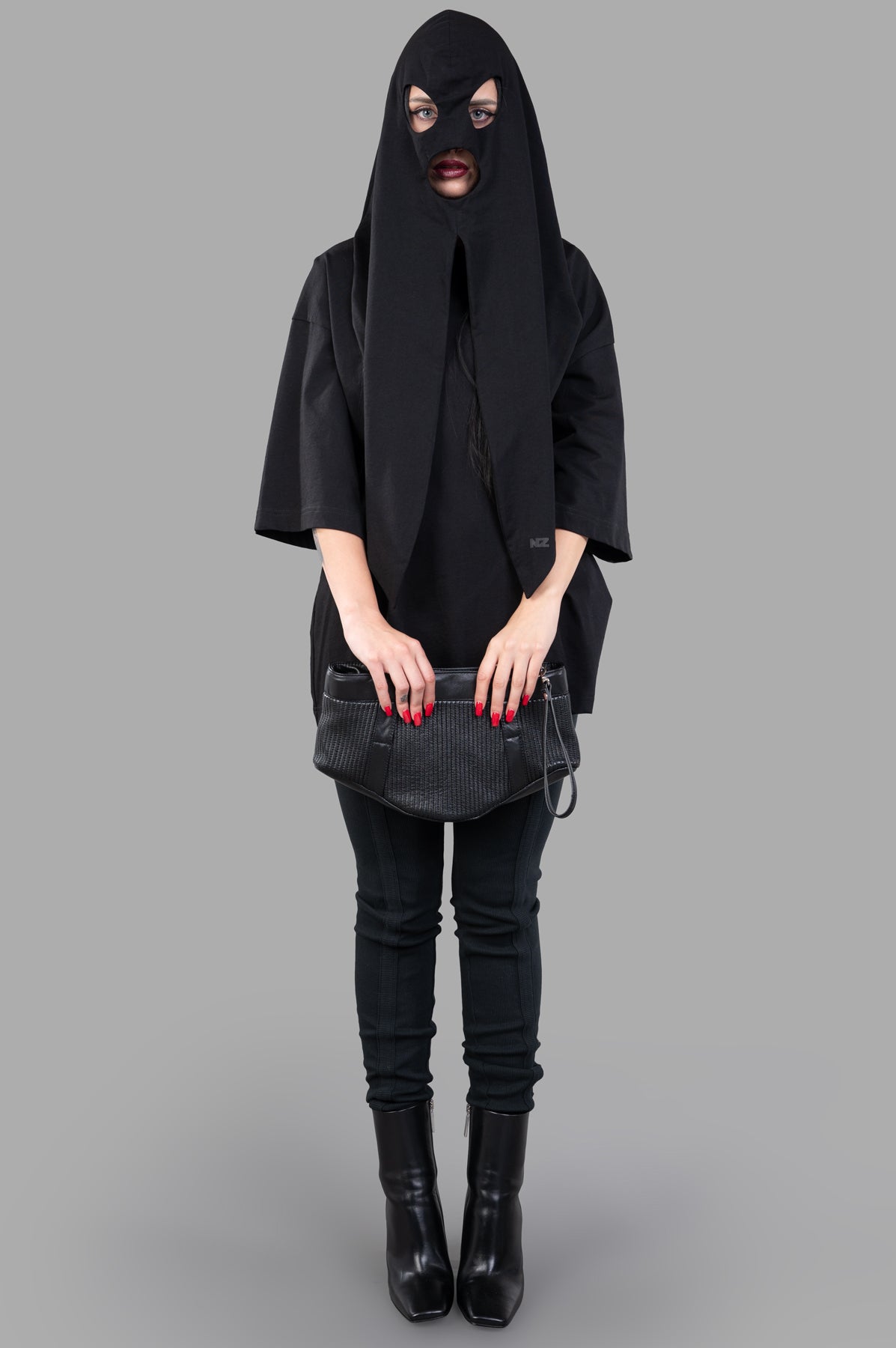 Natasha Zinko Bandit T-shirt, front view on-model, featuring unique hooded design with matching black accessories.