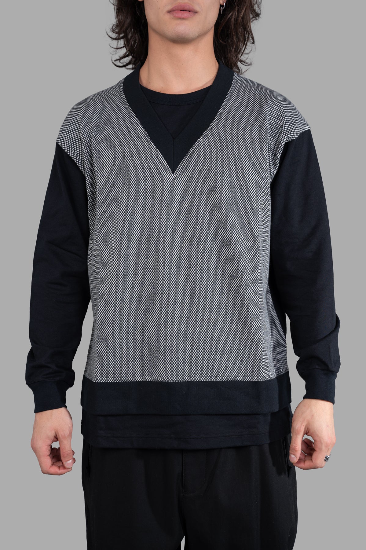 Comme des Garçons Relaxed-fit Sweater in black/white featuring a playful trompe l'oeil design, model displayed front view.