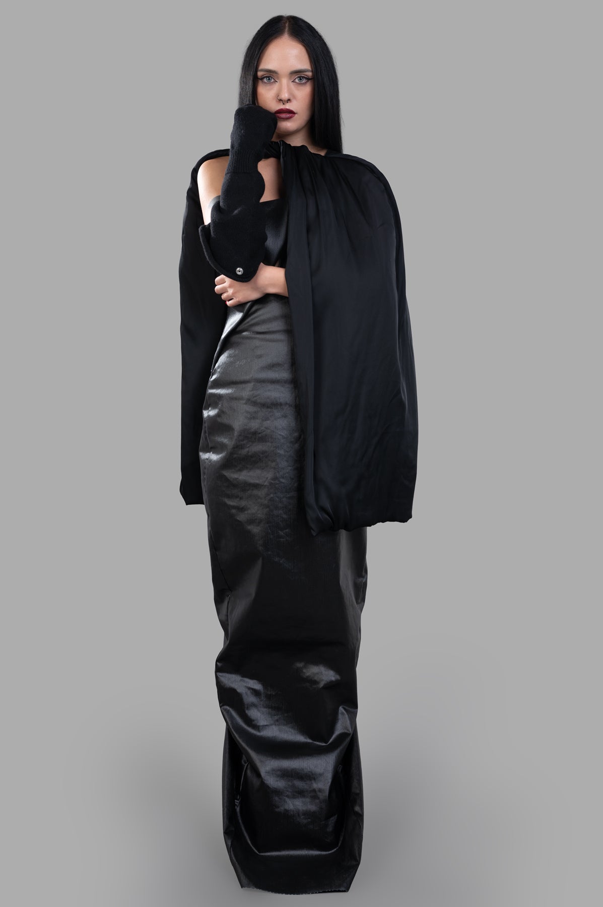 Rick Owens Cape Jacket, front view; model wearing a black flowing cape over a dress, long sleeve detail visible.