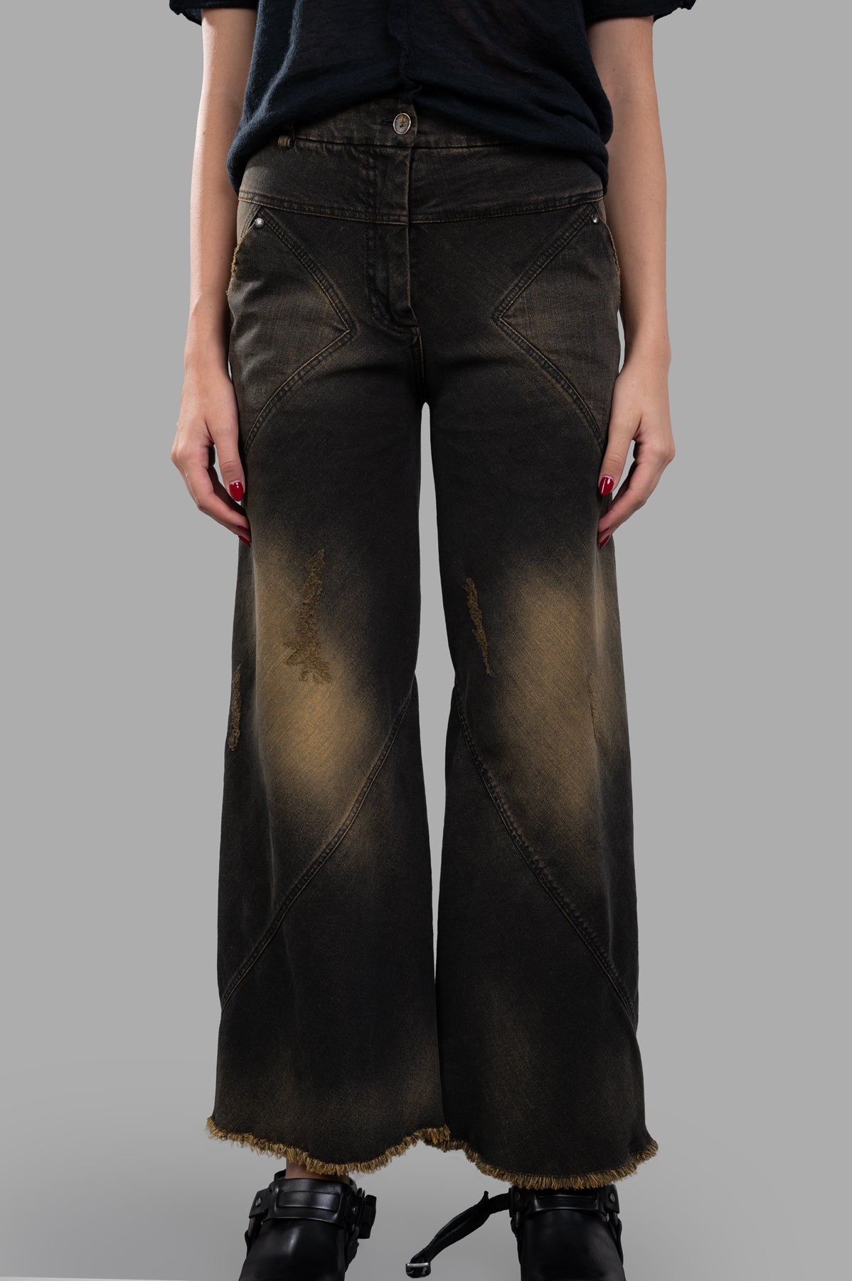 Masnada Faded Bootcut Jeans in unique turmeric color, featuring distressed details and wide-leg design, shown front view.
