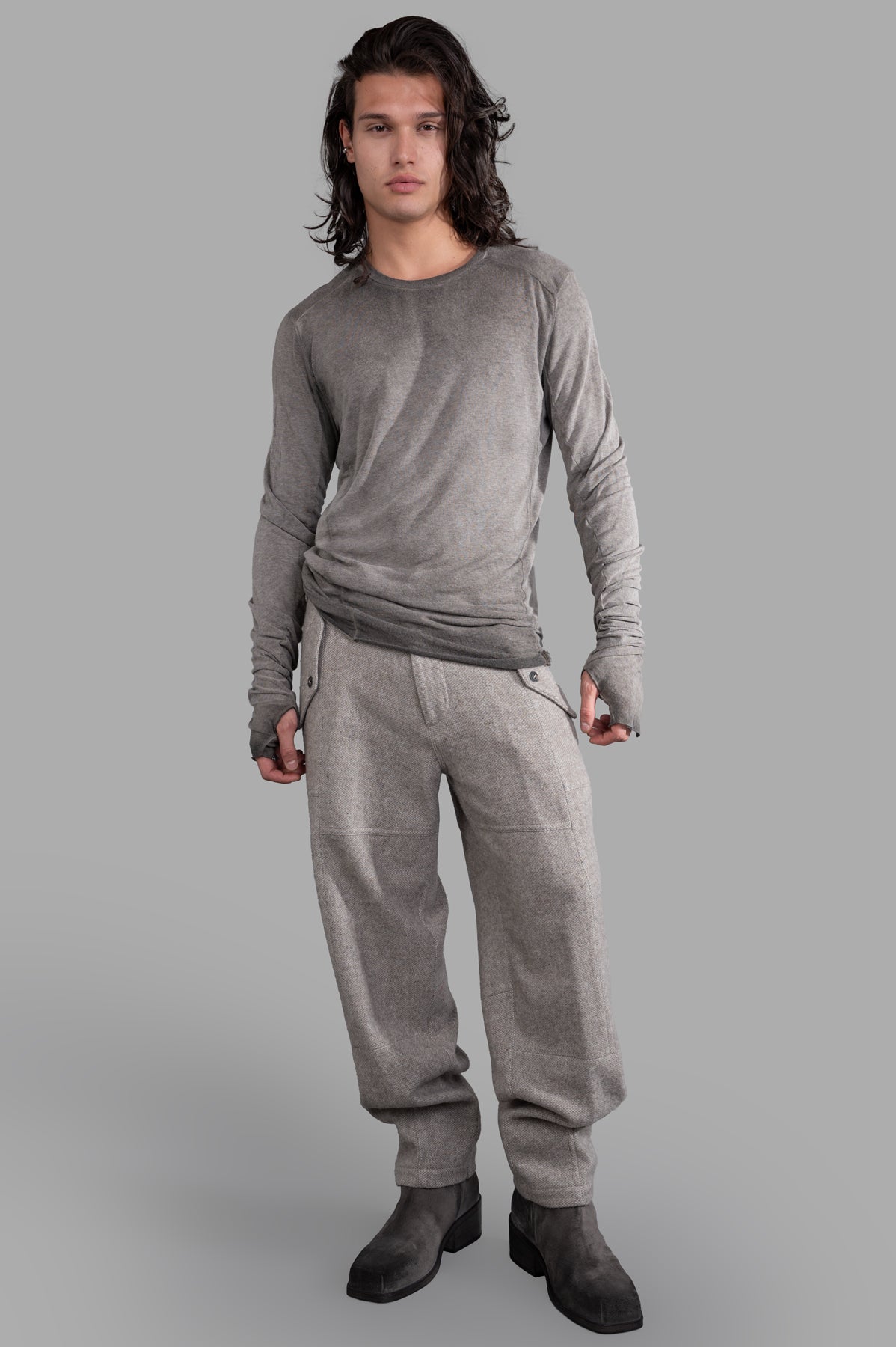 AION Pleated Military Pants in beige, front view on model, showcasing straight-leg design with utilitarian style.