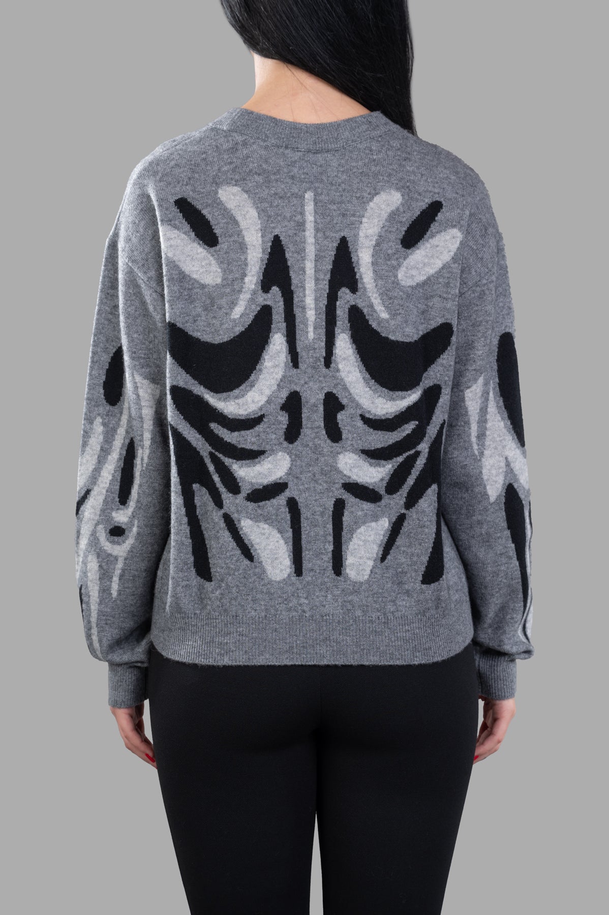 Natasha Zinko Muscle Jumper shown from the back, featuring a unique graphic design in a soft wool-cashmere blend.
