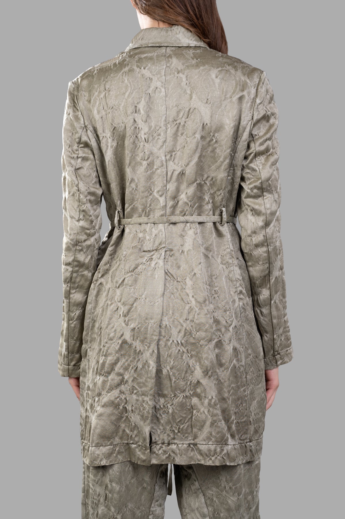 Masnada Long Textured Blazer showcases a back view with intricate texture and stylish belt detailing in green.