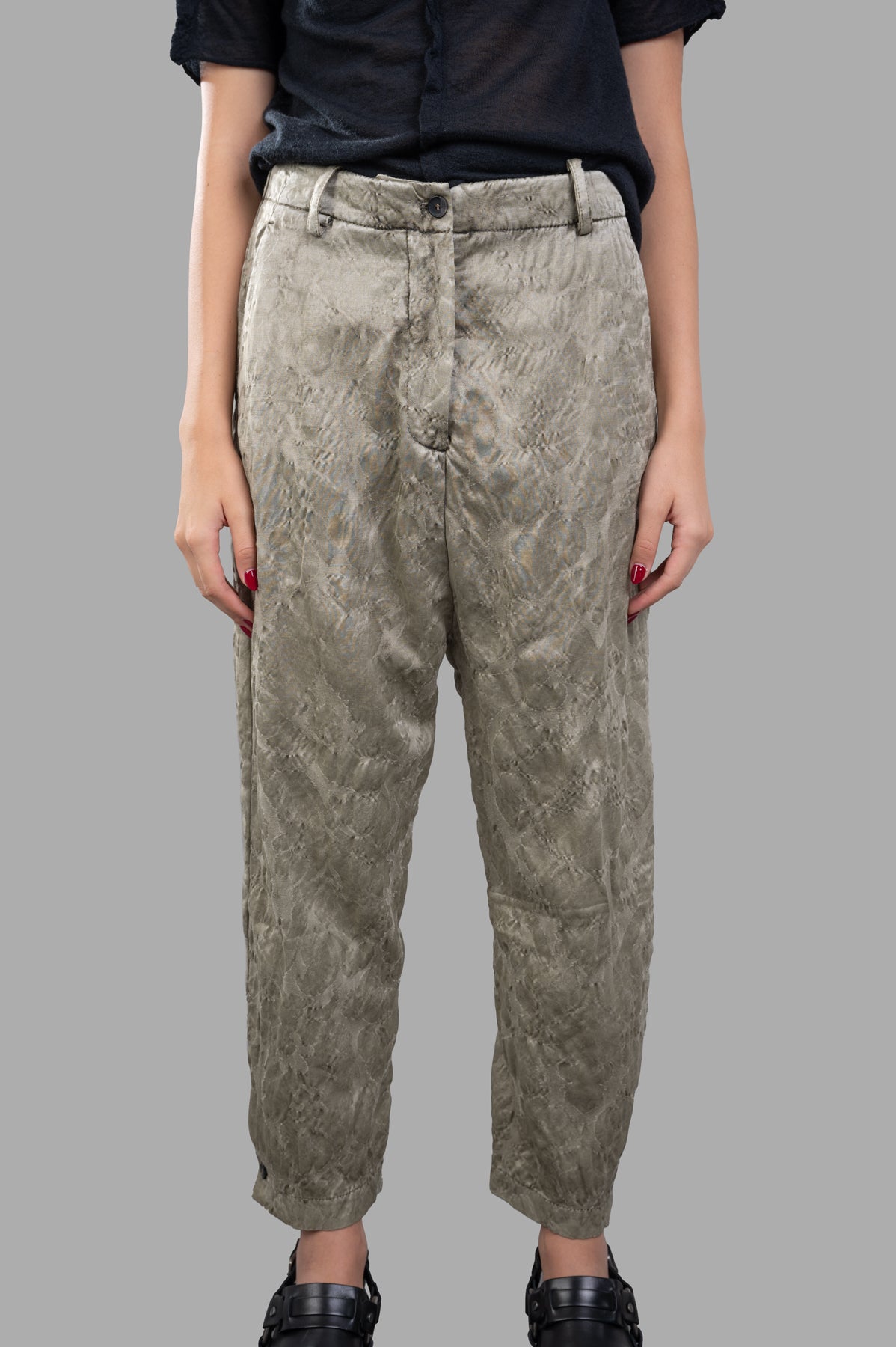 Masnada Textured Trousers in green, featuring a straight-leg design and drop crotch, displayed on a model for a stylish look.