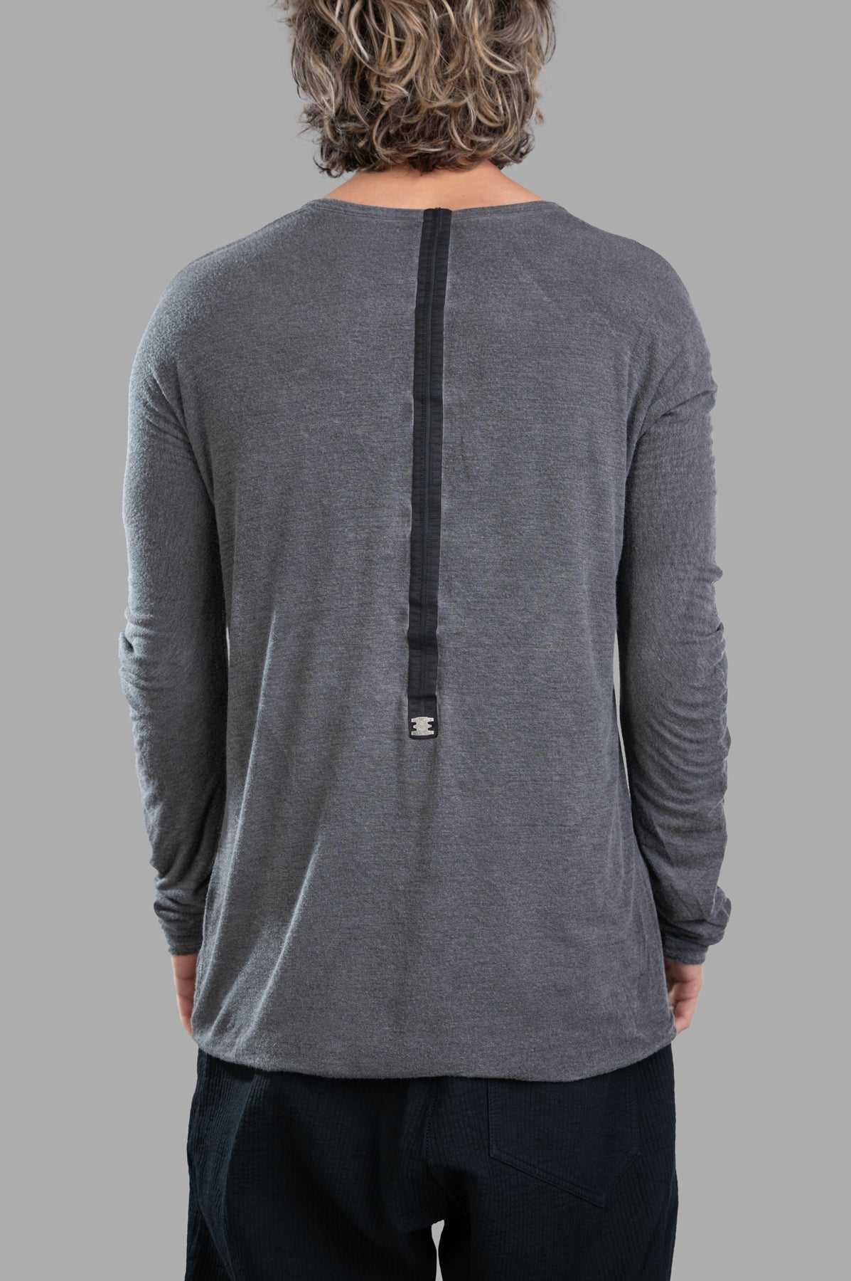 Isaac Sellam long-sleeved T-shirt shown from the back, featuring spine detailing in luxurious grey micromodal blend.