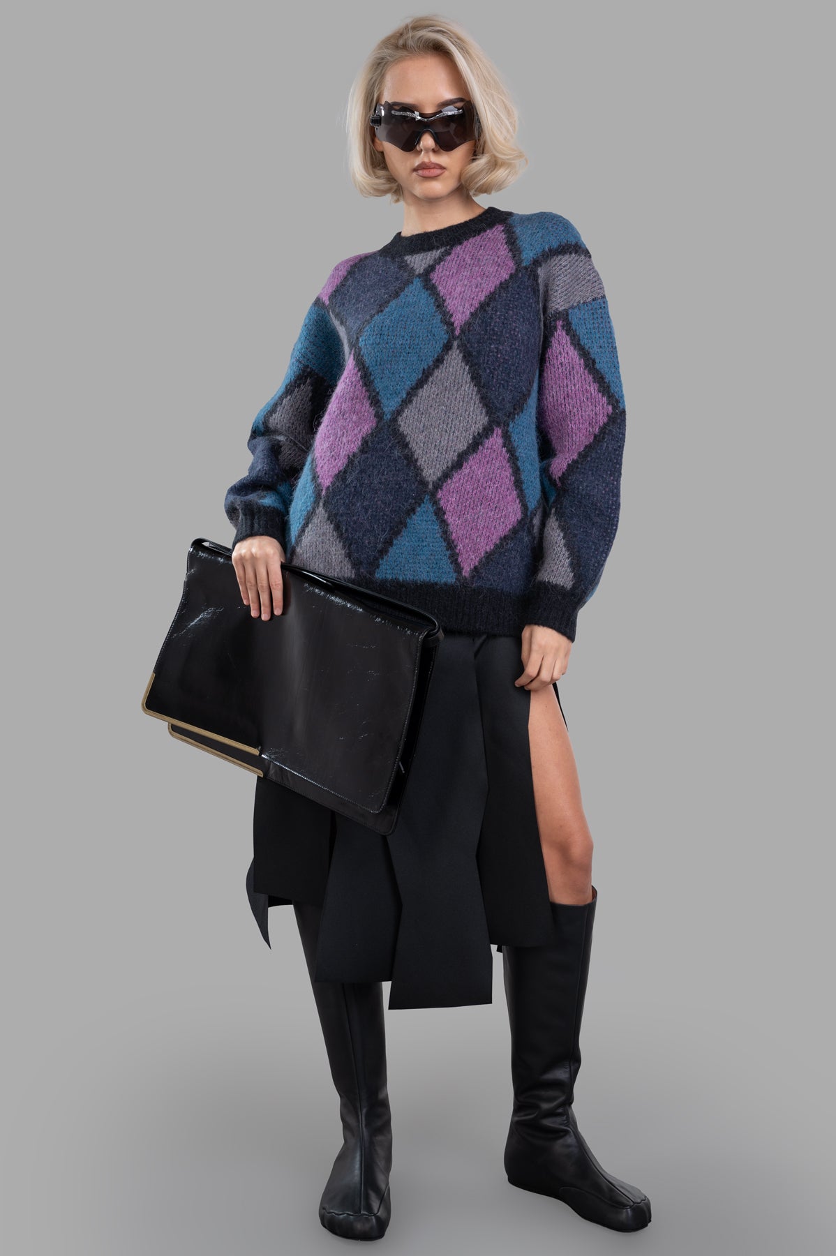 Anine Bing Sydney Crew Sweater in multicolor diamond intarsia, on-model view, paired with black accessories.