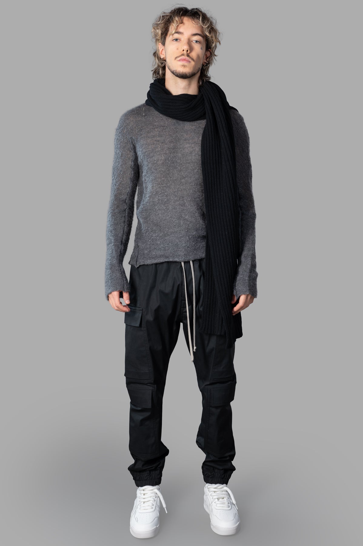Marc Point grey fitted sweater on model, front view, showing crewneck design and sleek silhouette.