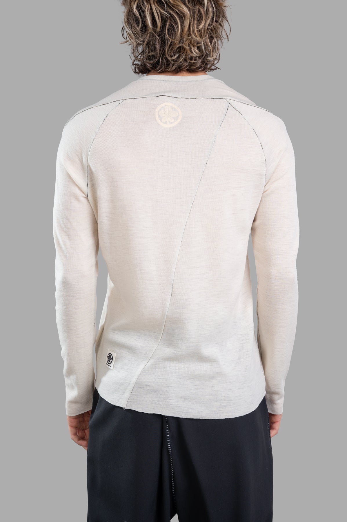 Marc Point Contrast-stitch Sweater in ecru, showcasing detailed back stitching and a luxurious form-fitting design.