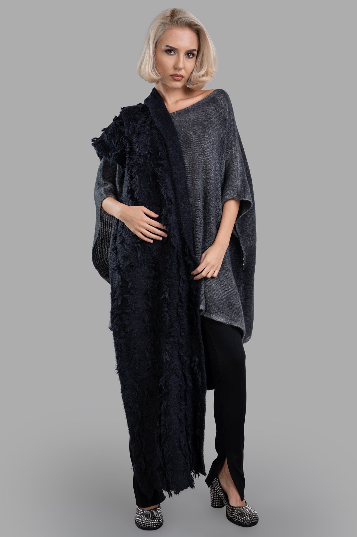Avant Toi grey tunic sweater on model, featuring a freeform silhouette, boat neck, and 3/4 sleeves with cashmere-silk blend.