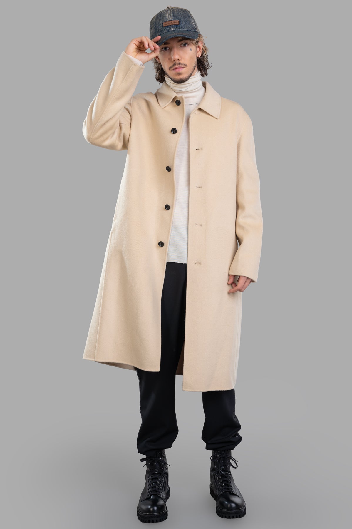 Attachment Camel Coat, front view on-model with button closure and relaxed fit, showcasing classic style and neutral tone.