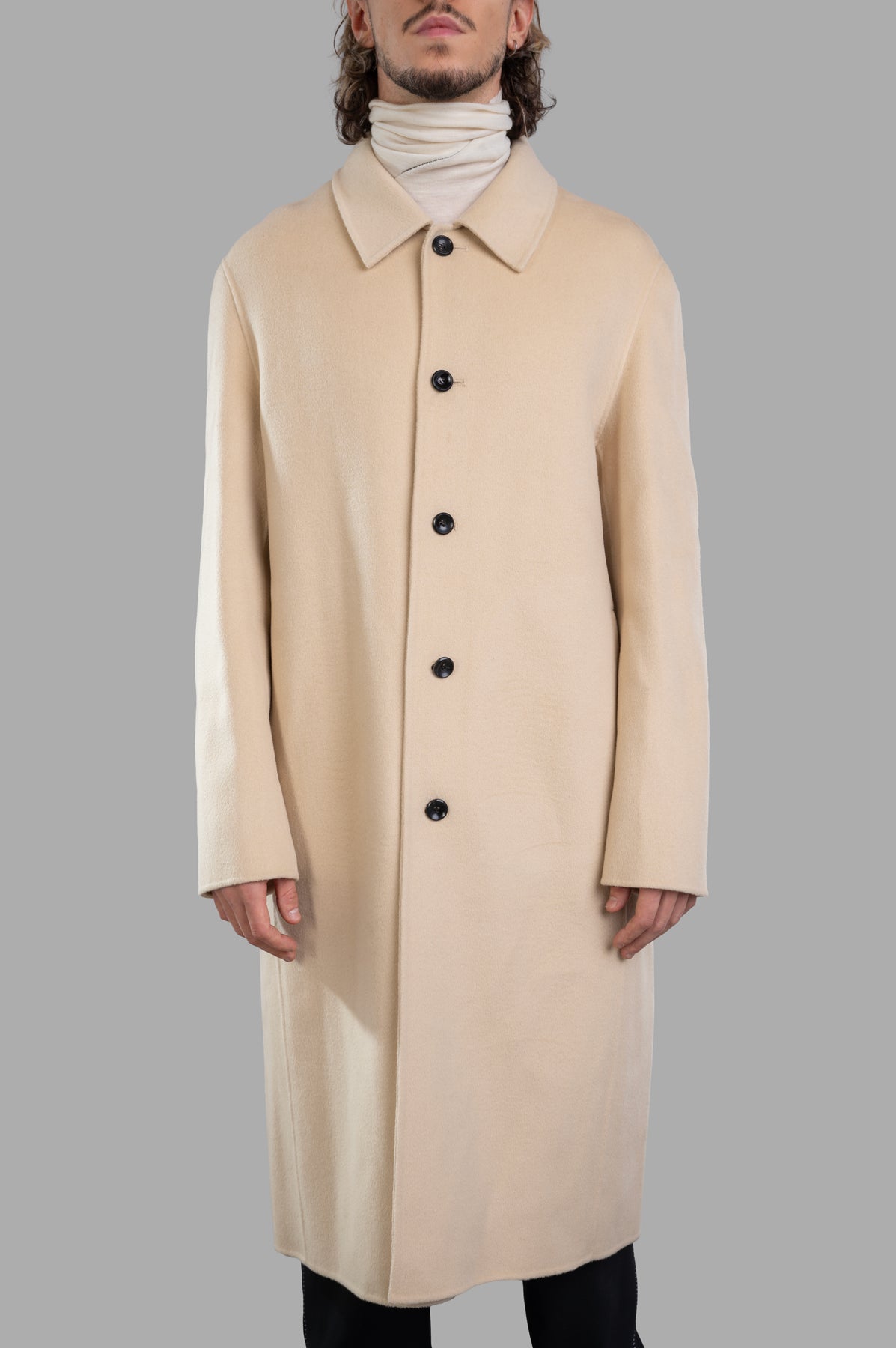 Attachment Camel Coat displayed on-model, showcasing front view with black buttons and a classic collar detail.