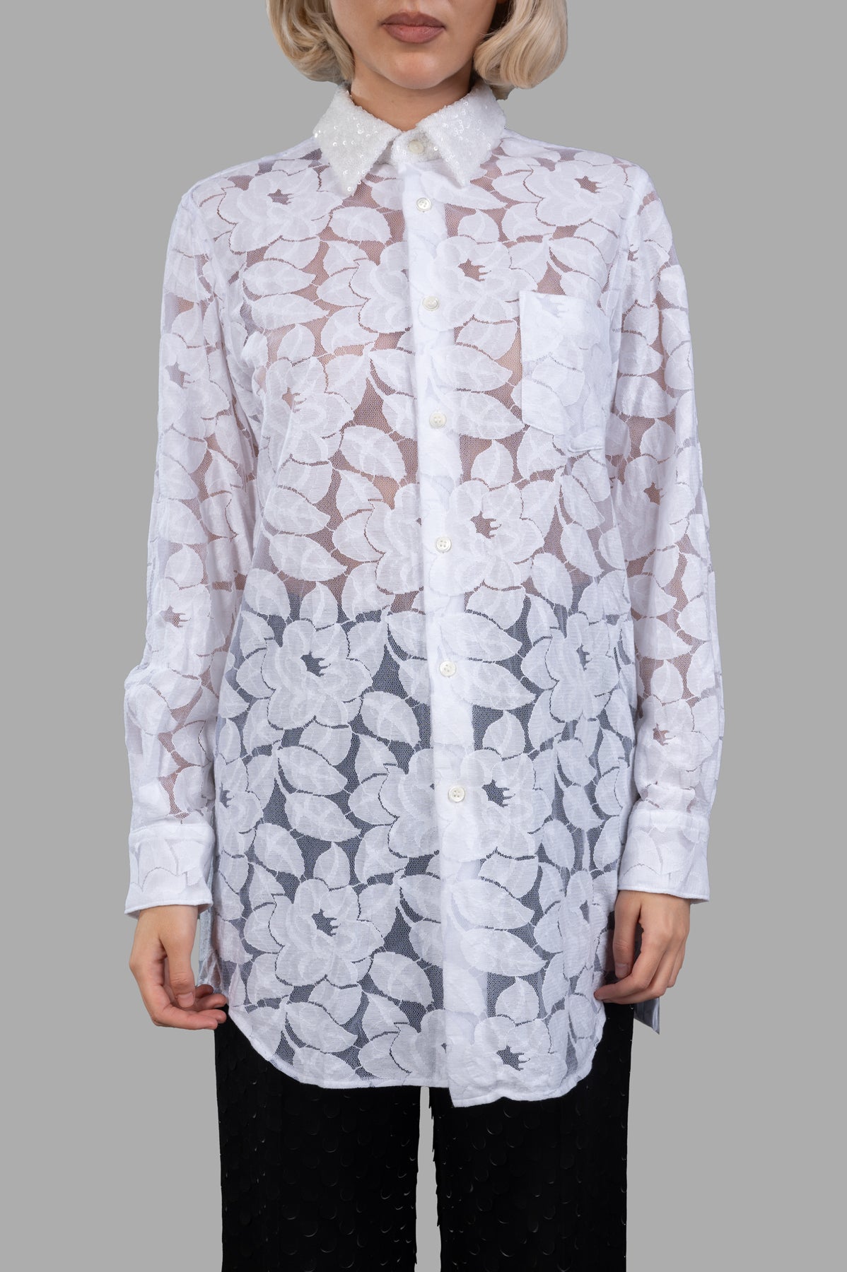 Comme des Garçons Floral Tulle Shirt featuring delicate flower designs and a sequin-detailed collar, model front view.