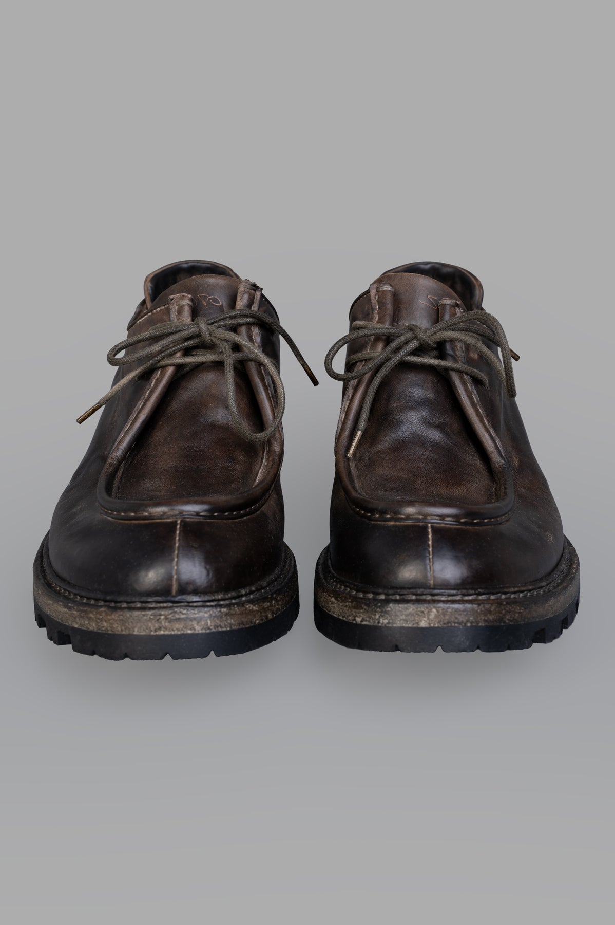 Shoto. Lace-up Shoes in brown leather, showcasing artisan craftsmanship and a durable Vibram sole from a front view.