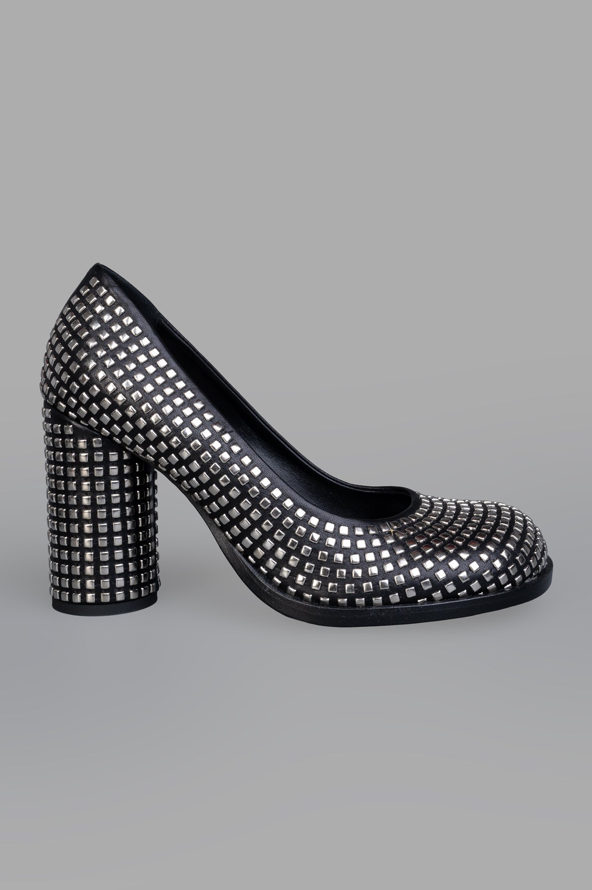 Mattia Capezzani Lia Heeled Shoes side view, black leather with metallic studs, 9 cm block heel, elegant design.