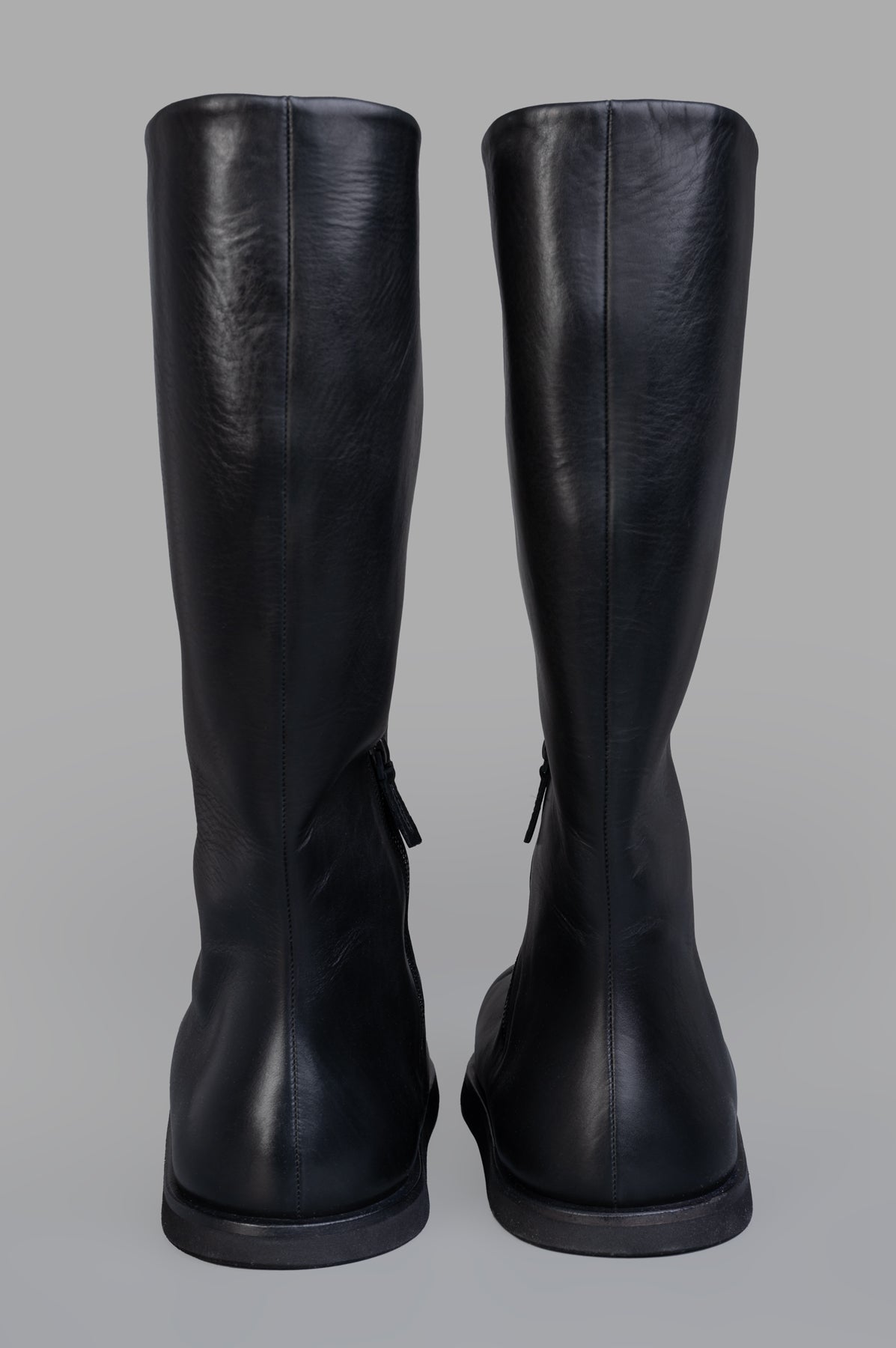 Marsèll Gigante Leather Boots, black leather, back view showcasing round toe and side zip fastening for comfort.