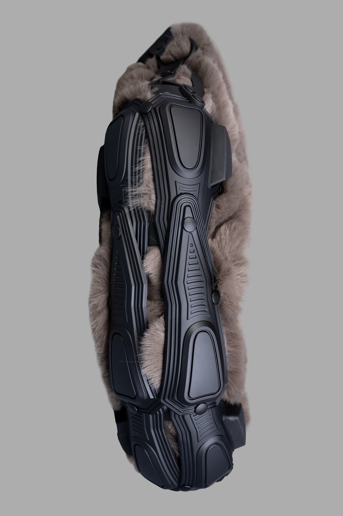 Innerraum Object M07 Crossbody Bag, featuring a faux fur exterior with a textured black bottom, showcasing unique design.