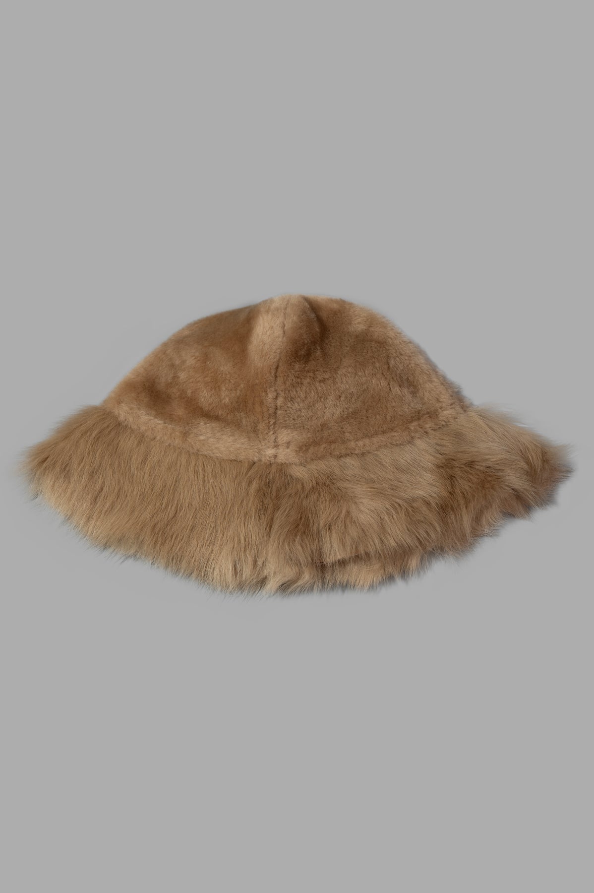 By Malene Birger Reversible Leather Bucket Hat in beige featuring soft lamb fur and a chic foldable shade.