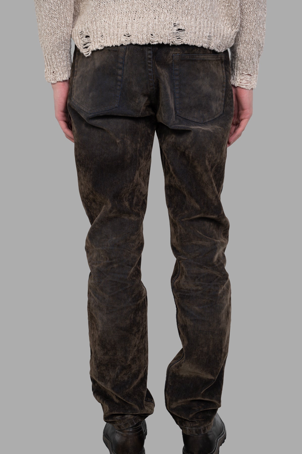 Helmut Lang Flocked Jeans showcasing the relaxed fit and velvet texture, viewed from the back against a neutral background.