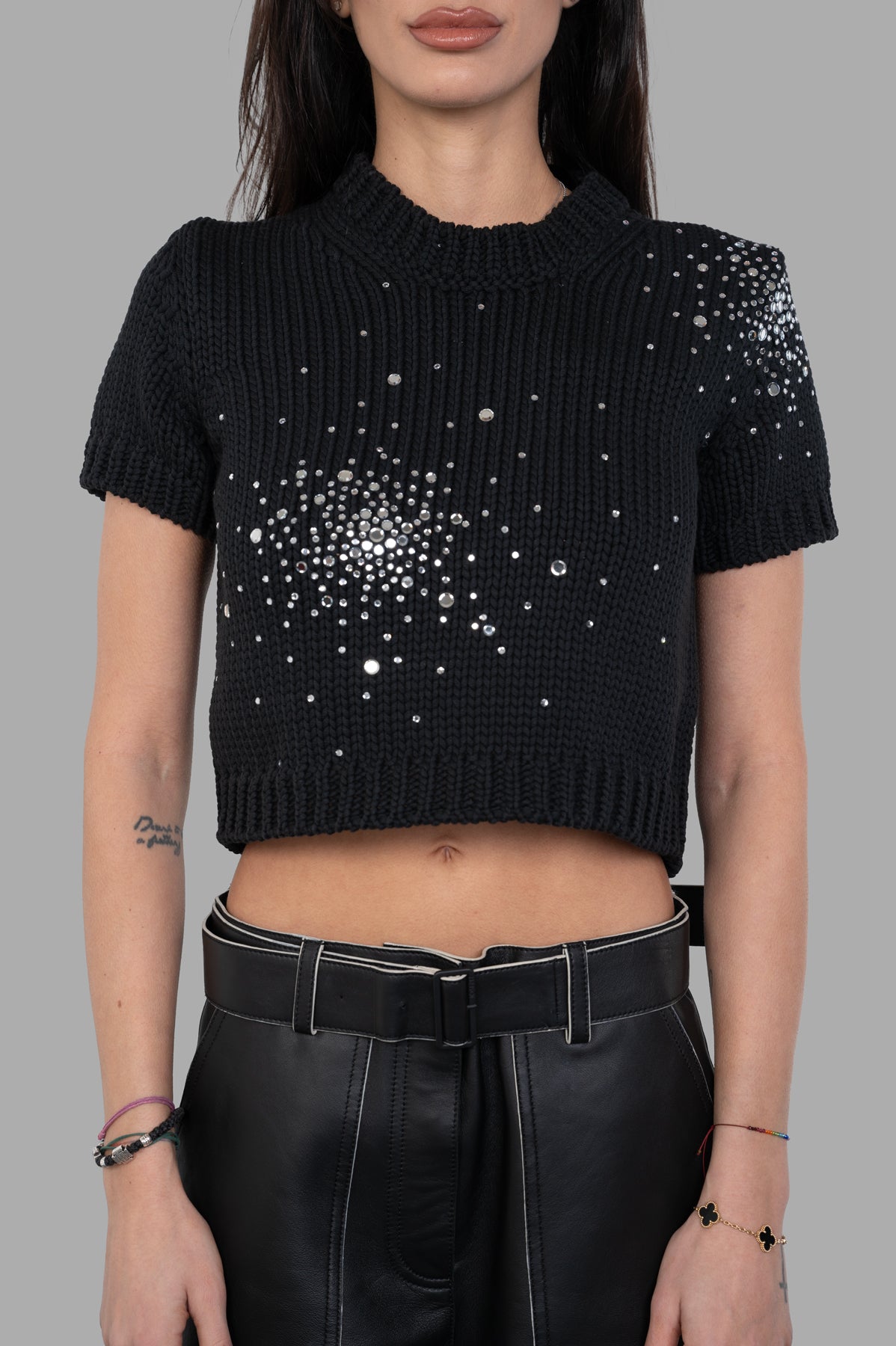 **Alt Text:** DES PHEMMES Chunky-knit Crop Top featuring short sleeves, round neckline, and sparkling embroidery in black, worn on model.