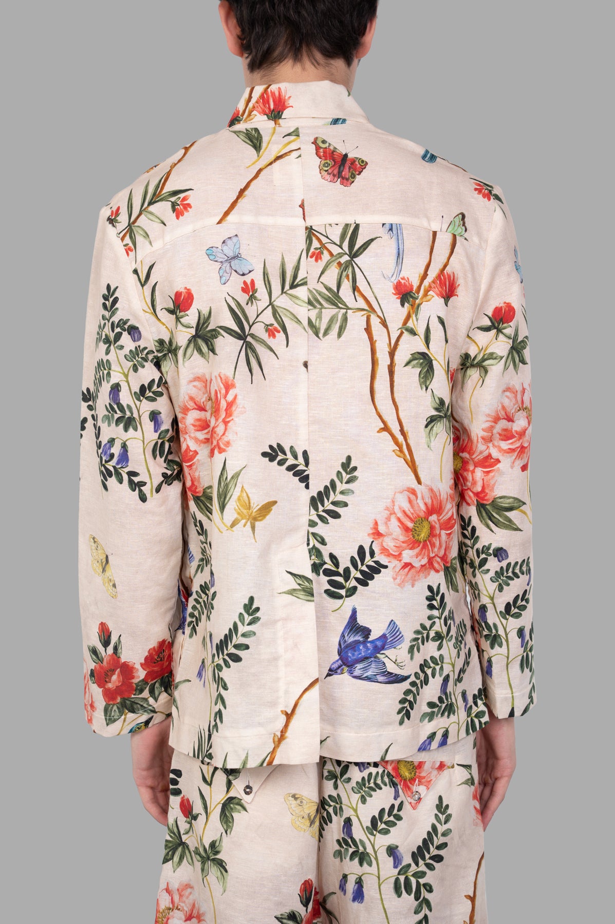 Marc Point Floral Shirt Jacket showcasing a beautiful floral pattern and back vent, offering style and comfort.