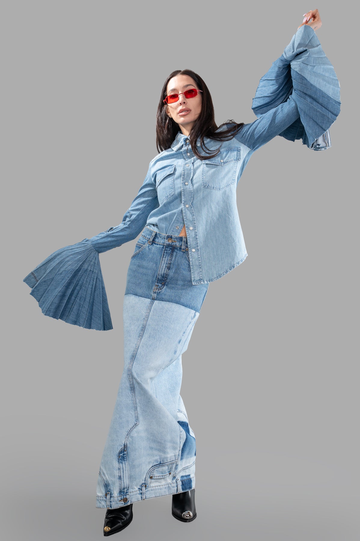 A.W.A.K.E. MODE Denim Shirt With Pleated Sleeves, on-model front view, featuring exaggerated cuffs and sculptural design.