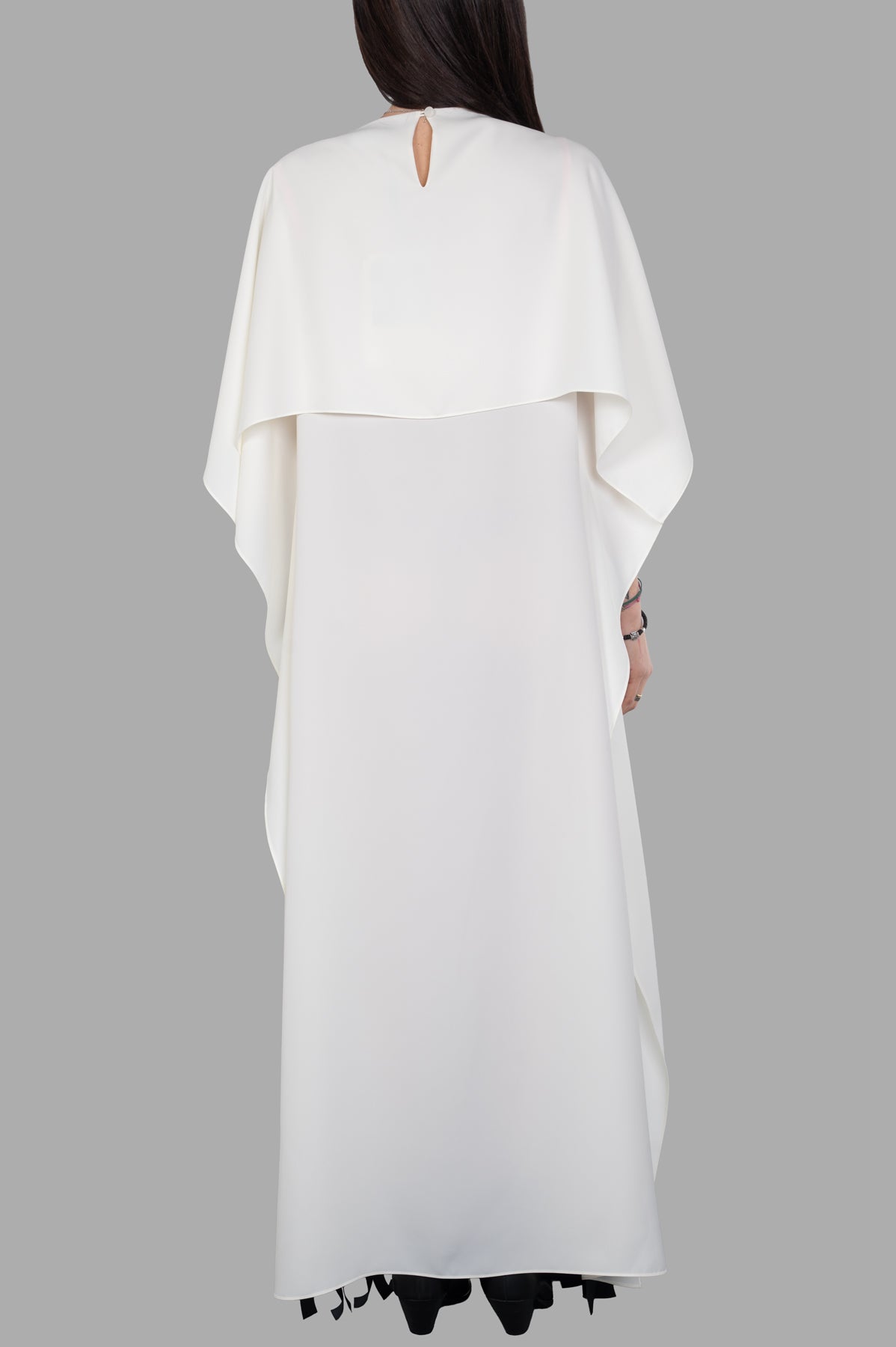 A.W.A.K.E. MODE Laser-cut Satin & Twill Gown in white, featuring a stylish cape-effect panel and button-fastening keyhole.