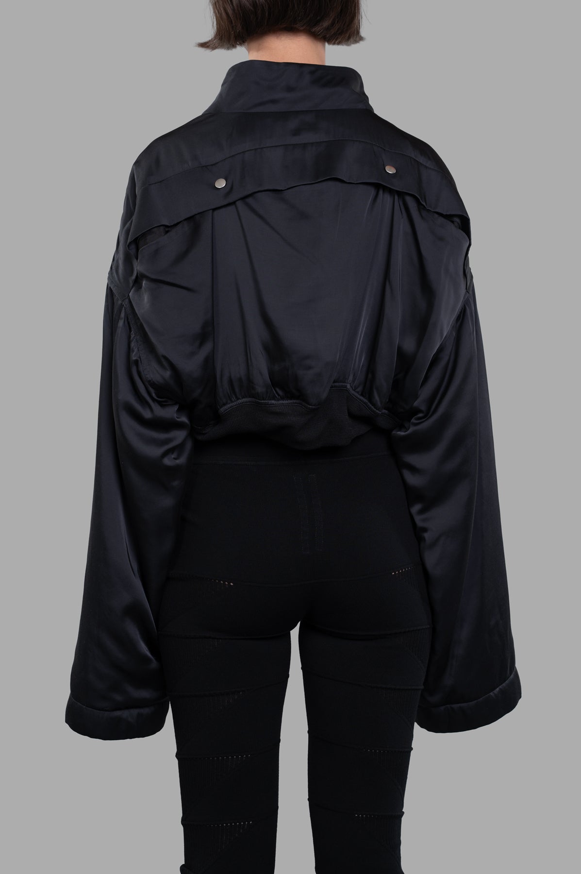 Rick Owens Anthem Flight Jacket, showcasing the back view on model with voluminous silhouette and sleek finish.