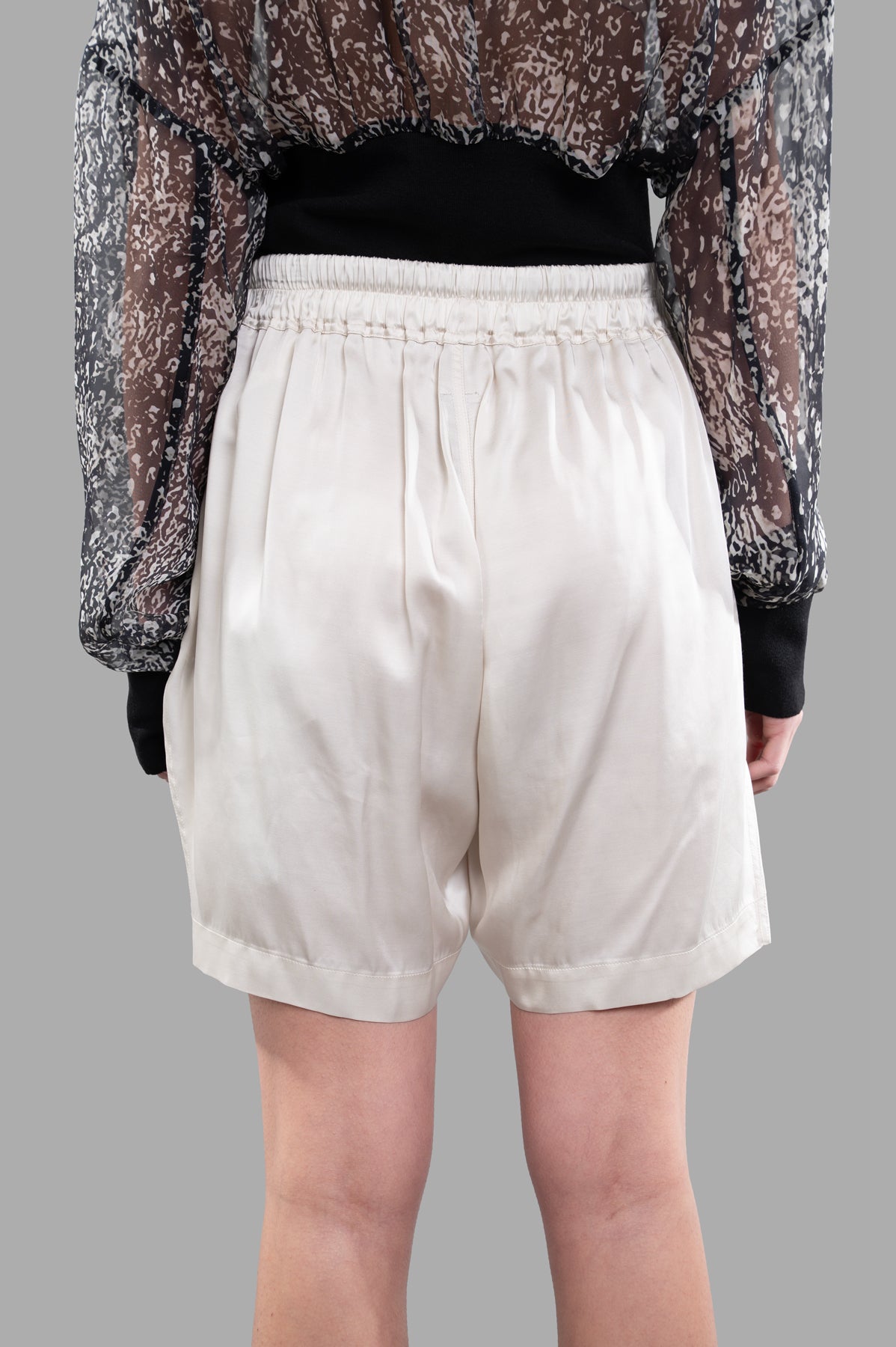 Rick Owens Creased Boxer Shorts displayed from the back, featuring an elasticized waistband in stylish ivory hue.