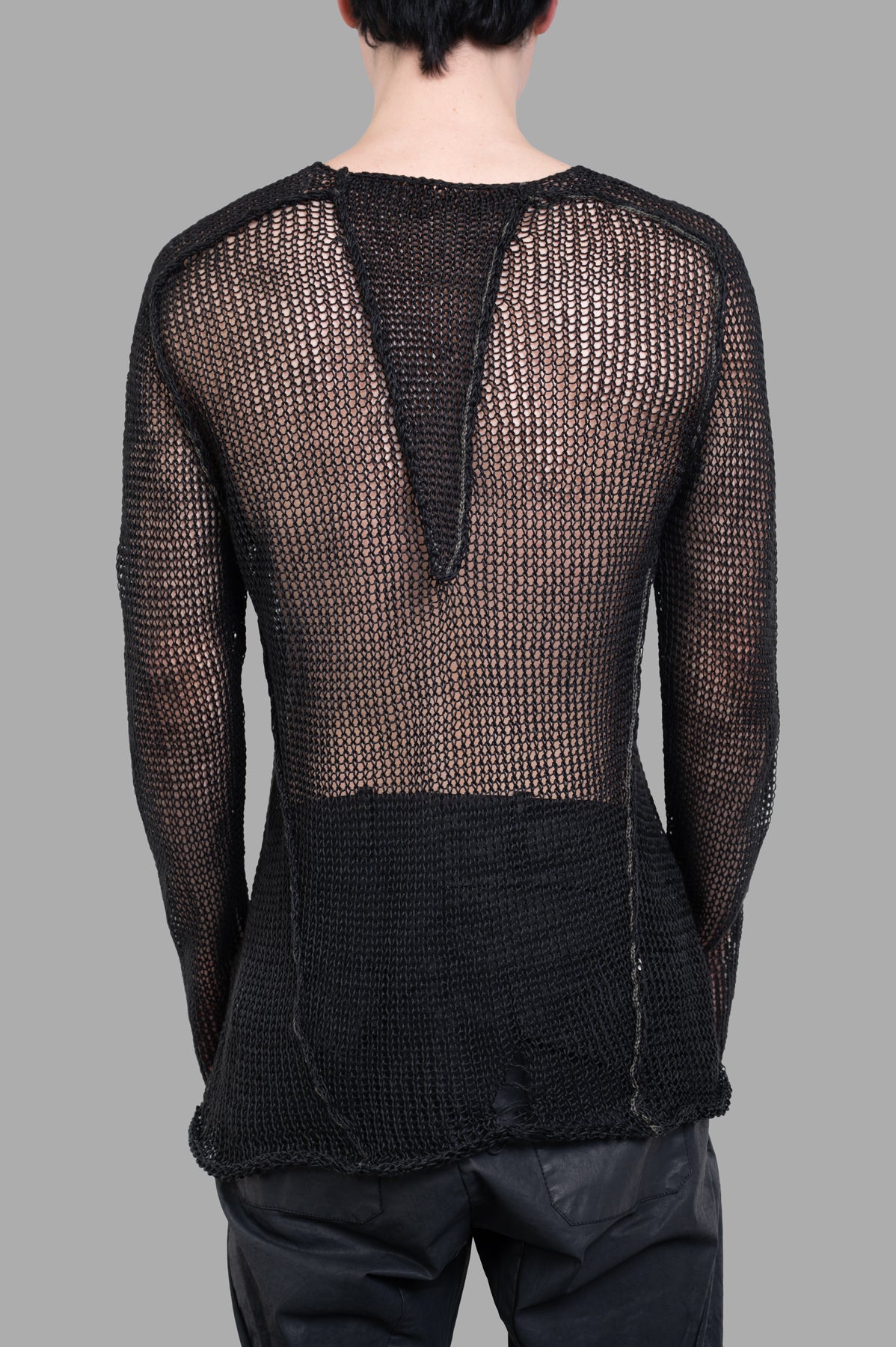 Masnada Mesh Sweater viewed from the back, showcasing a unique see-through mesh design in black linen.