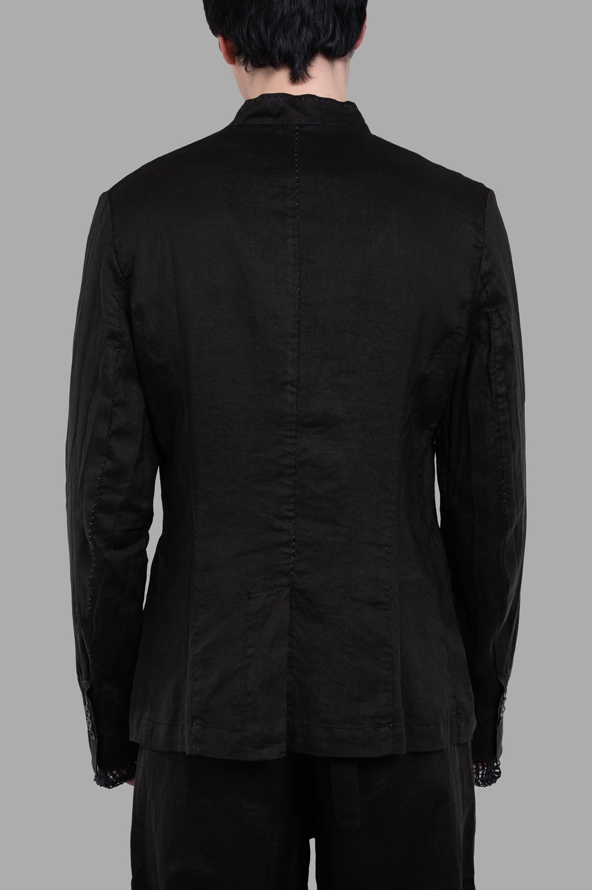 Masnada Single-breasted Blazer, back view showcasing collarless design and textured black ramie fabric.