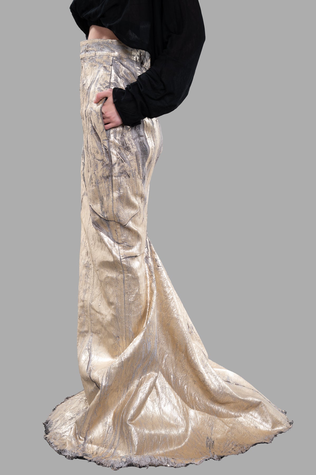 Rick Owens Lido Maxi Skirt in gold, showcasing a side view with luxurious sheen and elegant train. Perfect for bold.