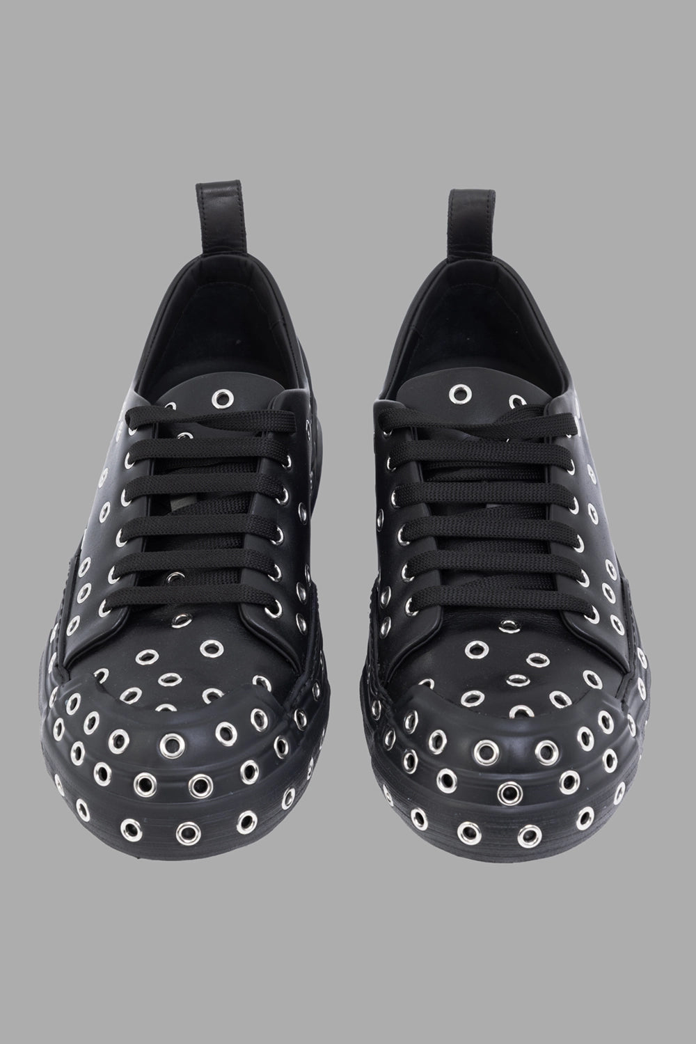 Mattia Capezzani sneakers in black, front view, round toe with dense eyelet pattern and flat laces