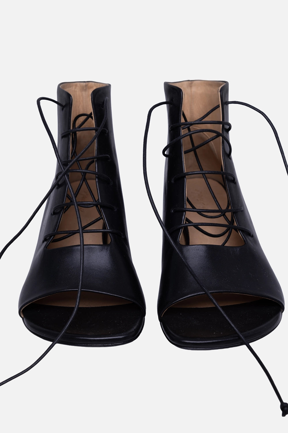 Open-toe lace-up ankle boots in black smooth calf leather, front view showing lacing and open toe