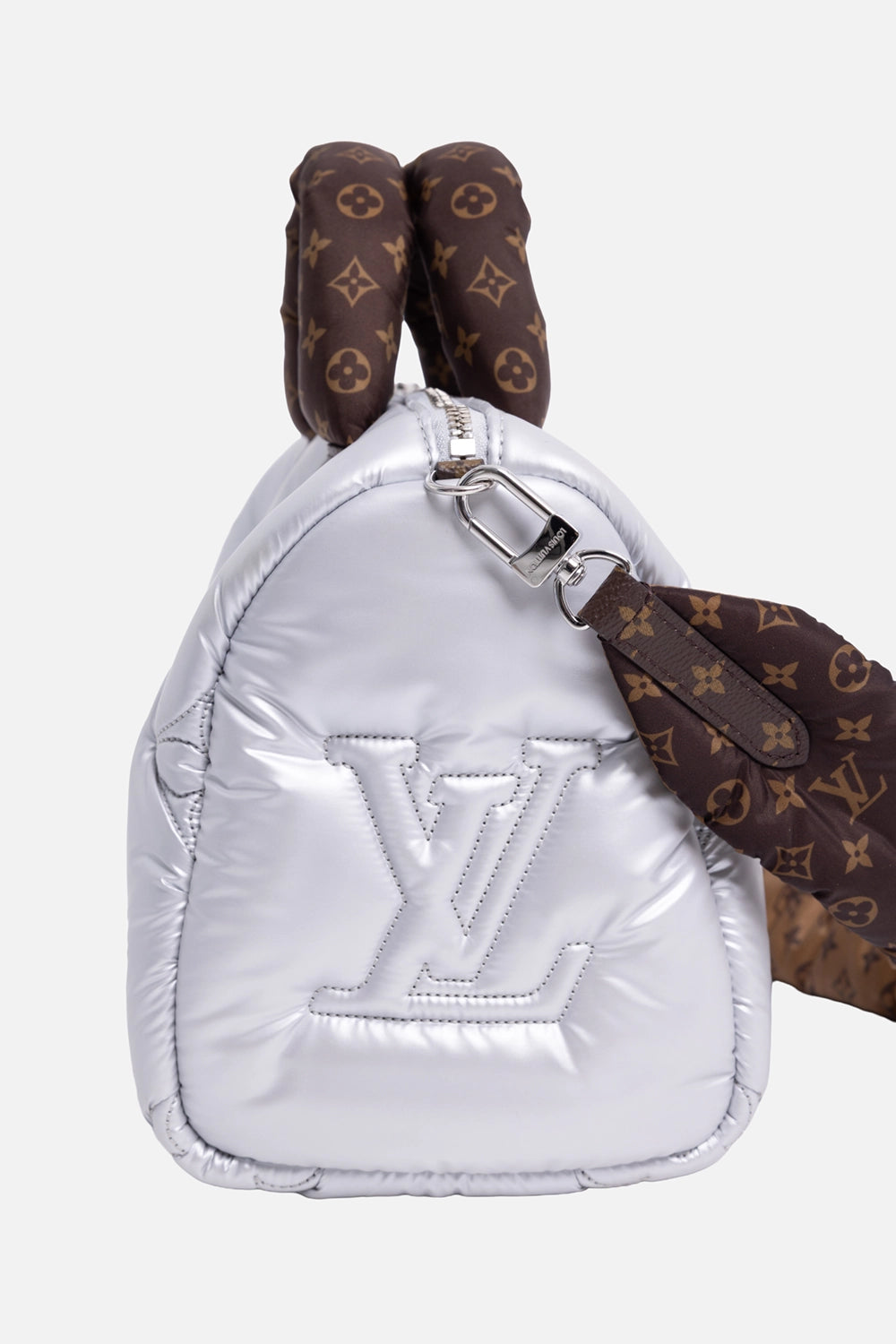Pre-owned Louis Vuitton Speedy Bandoulière 25 bag in silver, side view, embossed LV patch and silver-tone zipper hardware