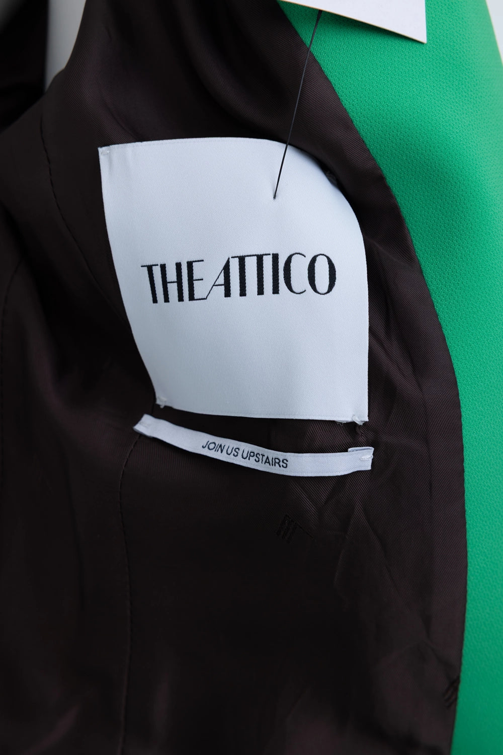 Pre-owned The Attico women's suit set in green, interior label view, black lining with brand patch