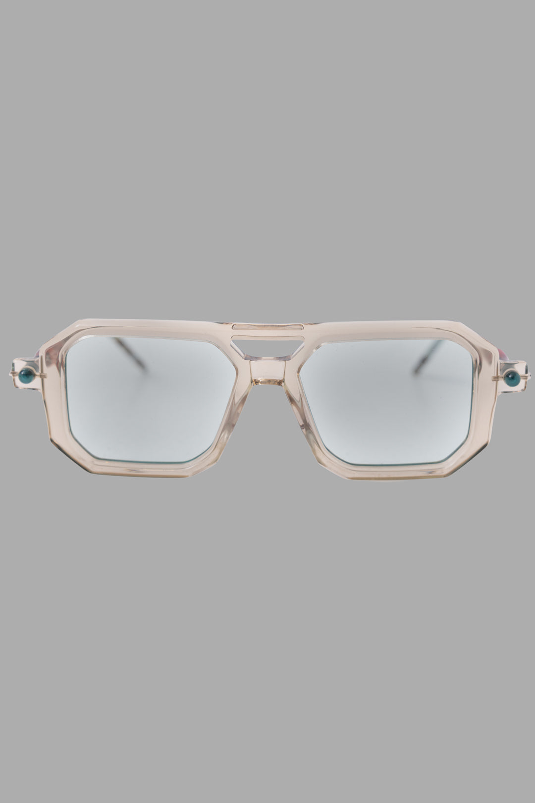 Kuboraum unisex sunglasses in champagne acetate with light green lenses, front view, geometric aviator shape.