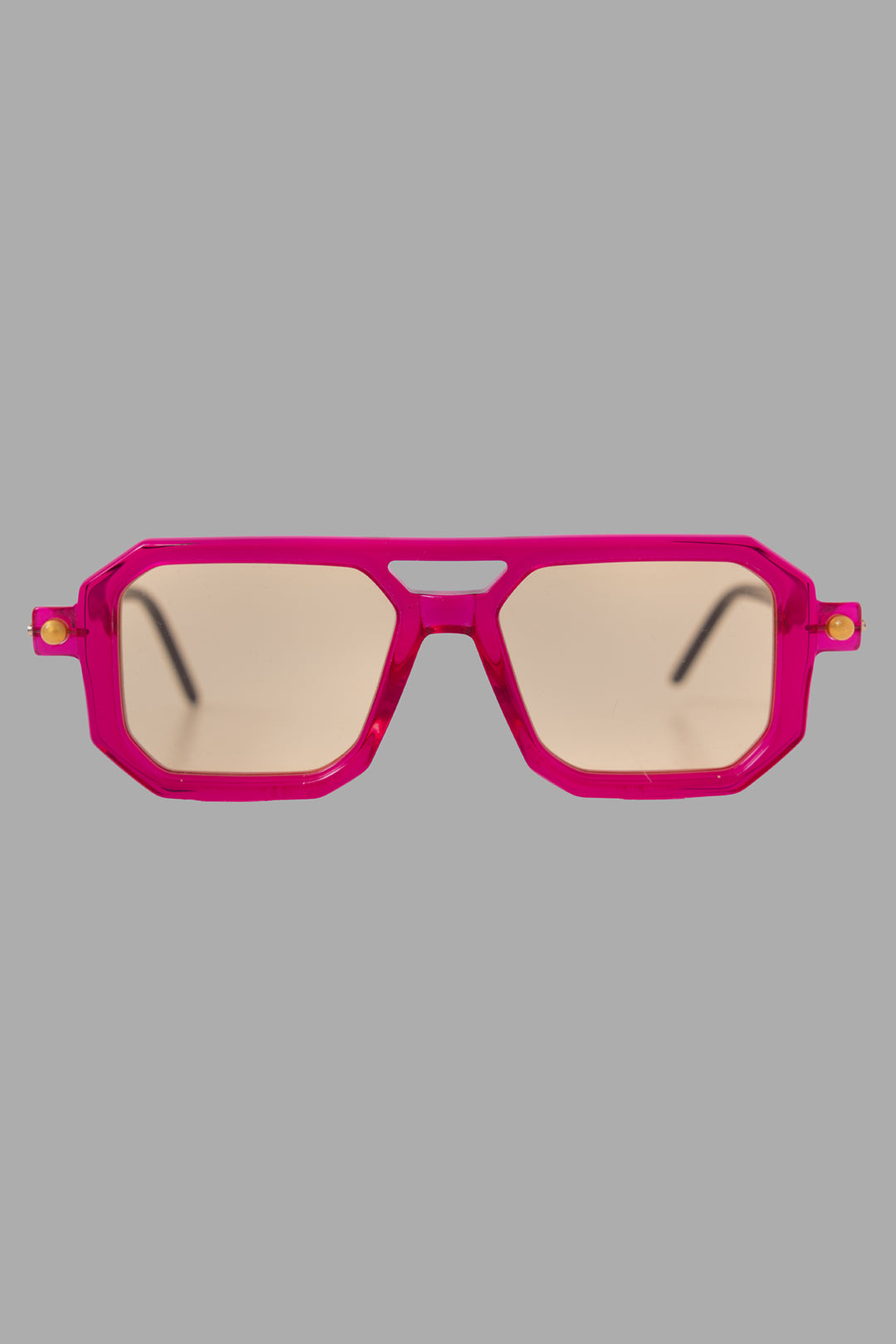 Kuboraum unisex magenta sunglasses, front view with geometric frame and light orange lenses.