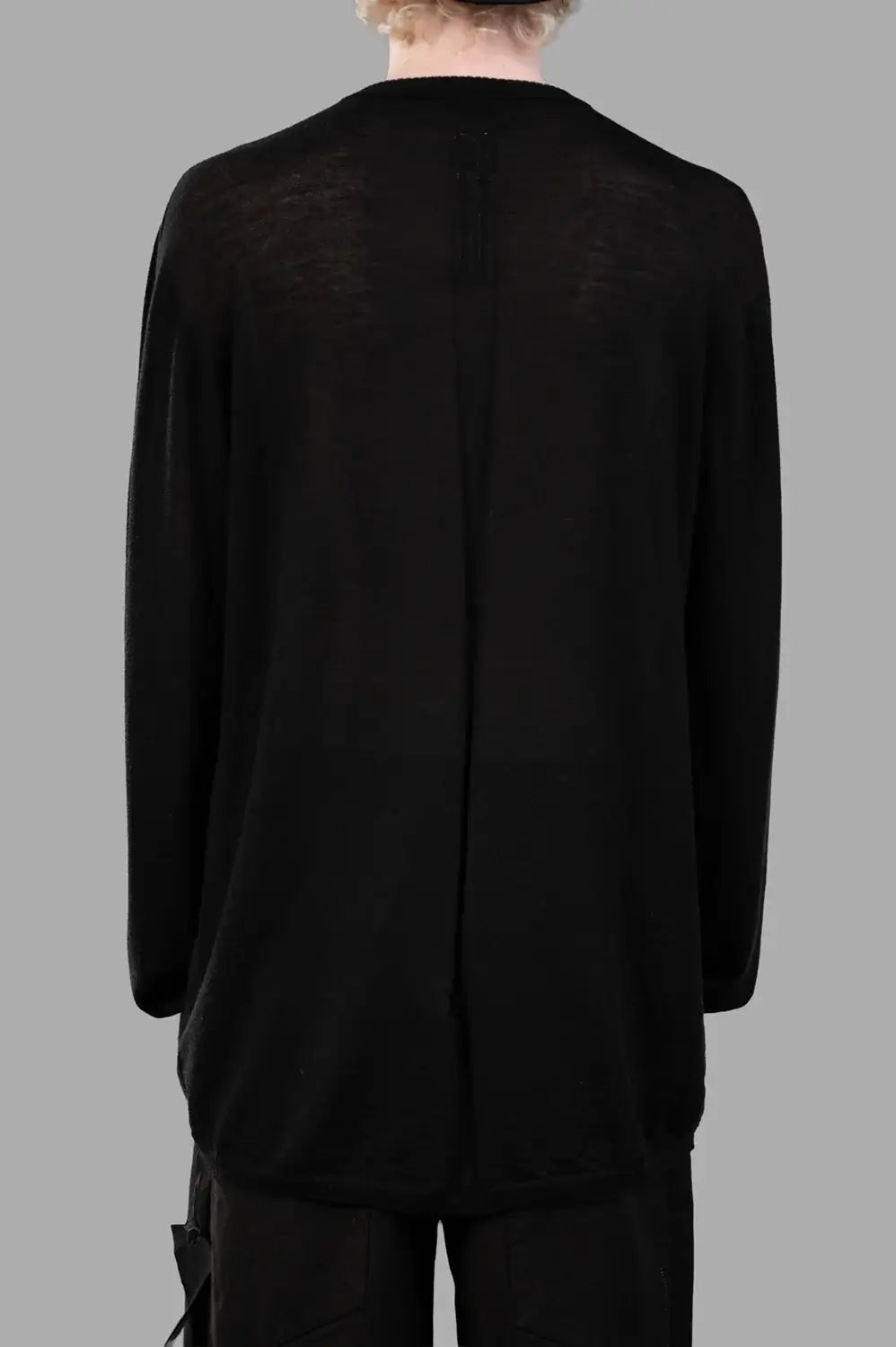 Rick Owens sweater in black, back view, signature center back seam and ribbed hem