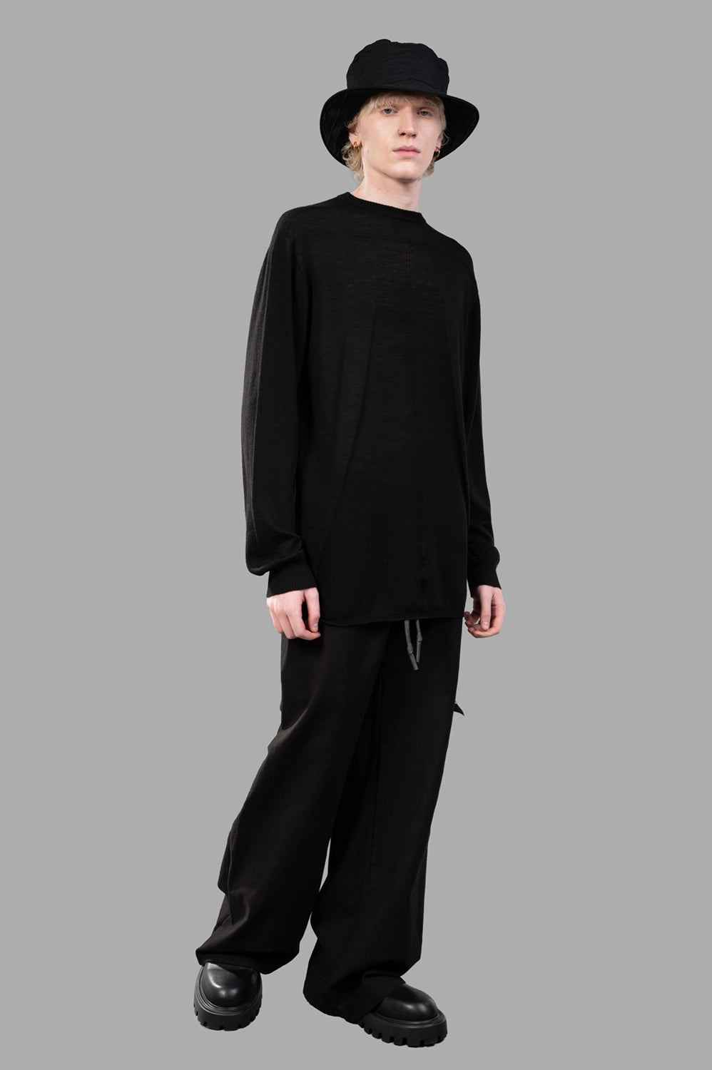 Rick Owens sweater in black, on-model full length, oversized below-hip fit in lightweight knit