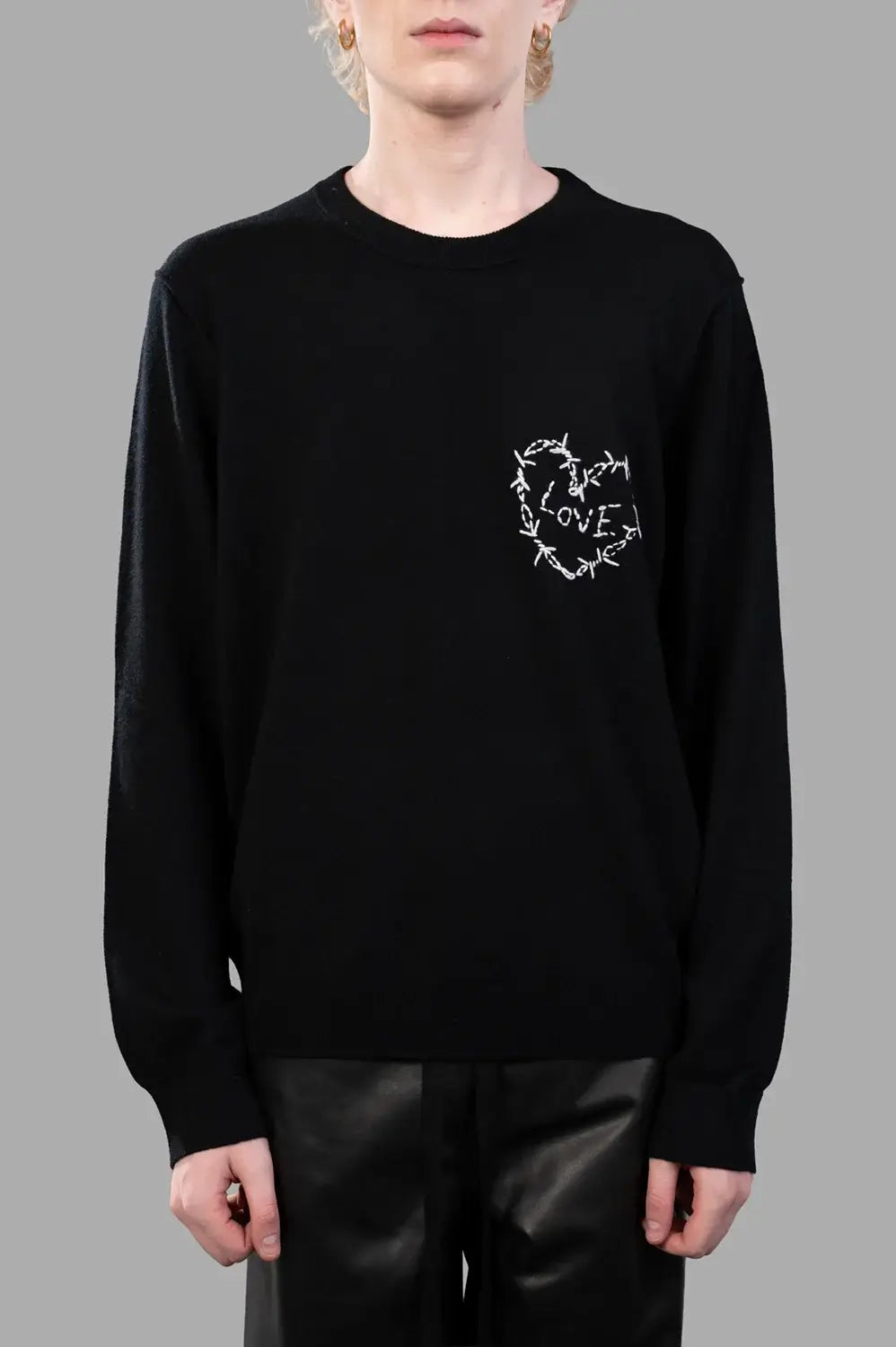 Zadig & Voltaire sweater in black, on-model half length, ribbed crewneck with barbed-wire heart chest motif