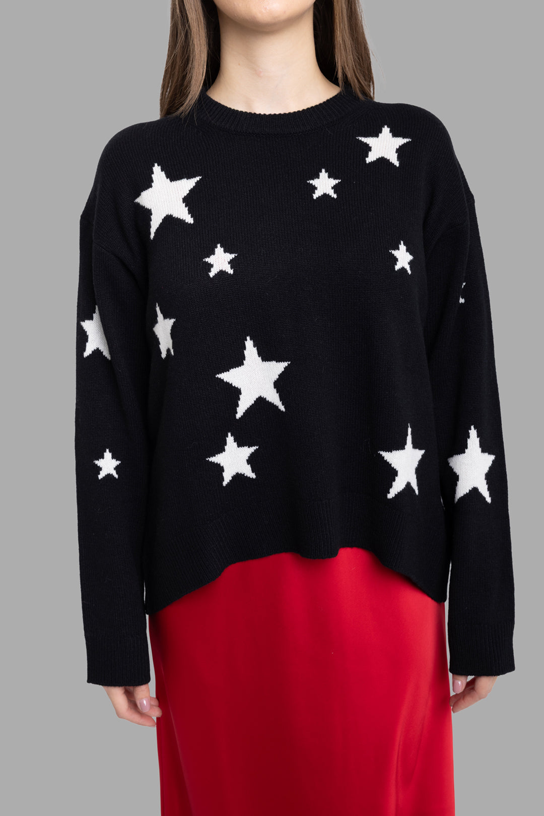 Zadig & Voltaire women's black sweater, on-model half-length view showing white star intarsia front.
