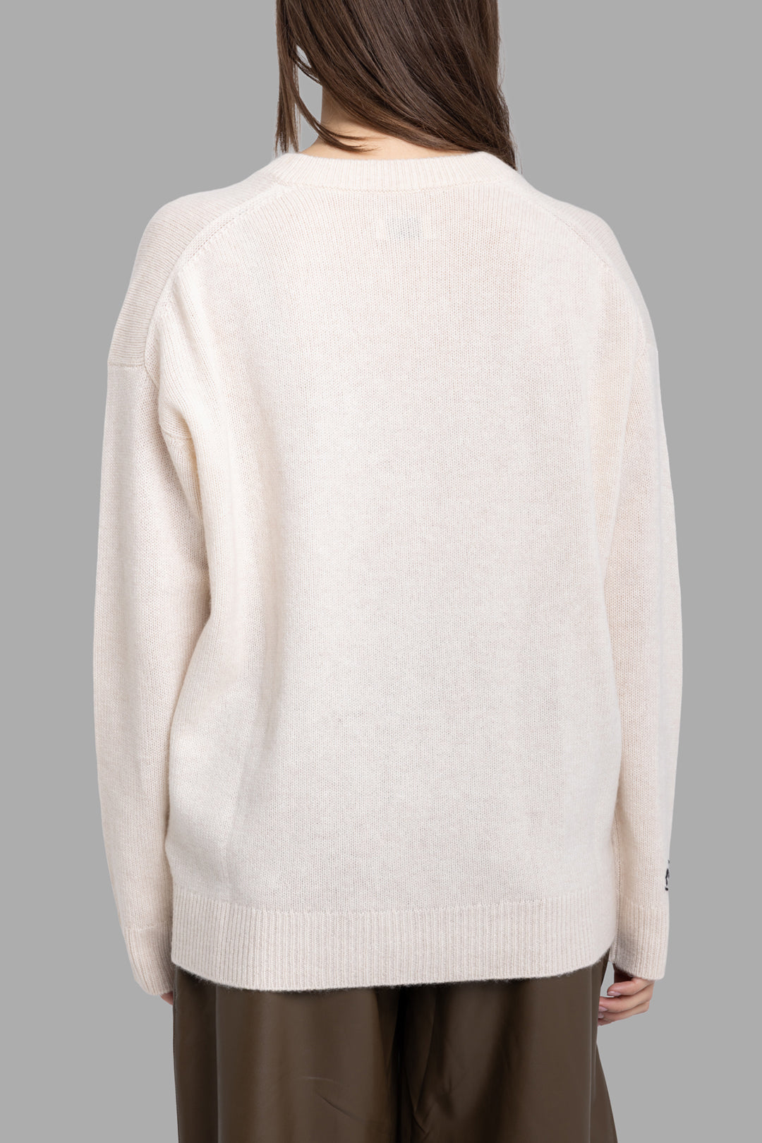 Zadig & Voltaire women's ecru cashmere sweater, back view showing clean knit and ribbed hem.